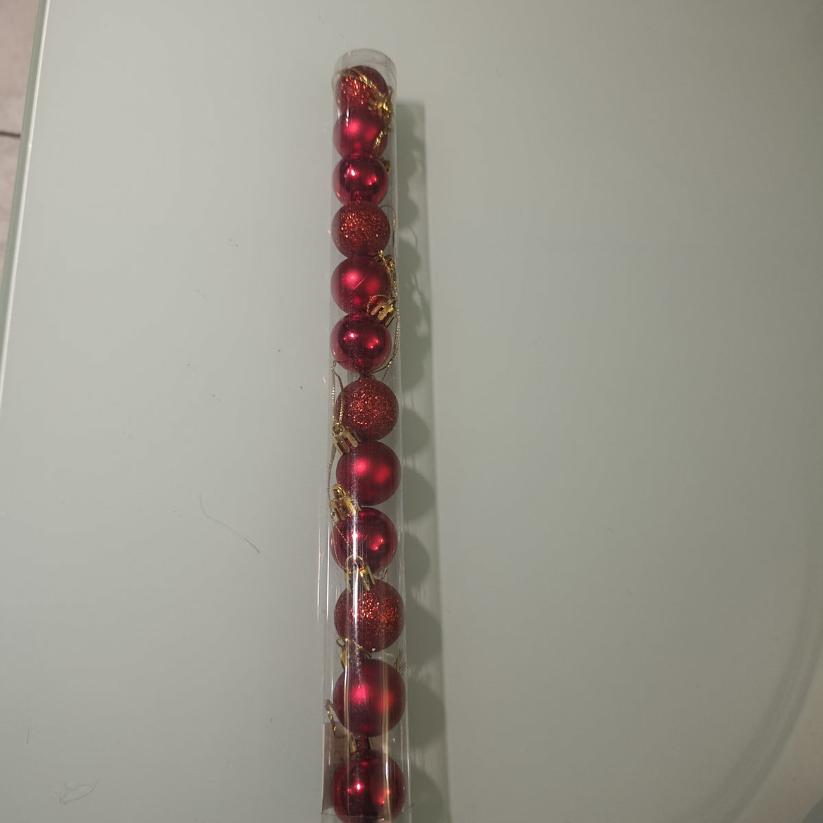 DOCENA DE ESFERAS DE 3 CM EN TUBO SURTIDAS EN EL TUBO ACABADOS  BRILLANTE, MATE Y ESCARCHADO