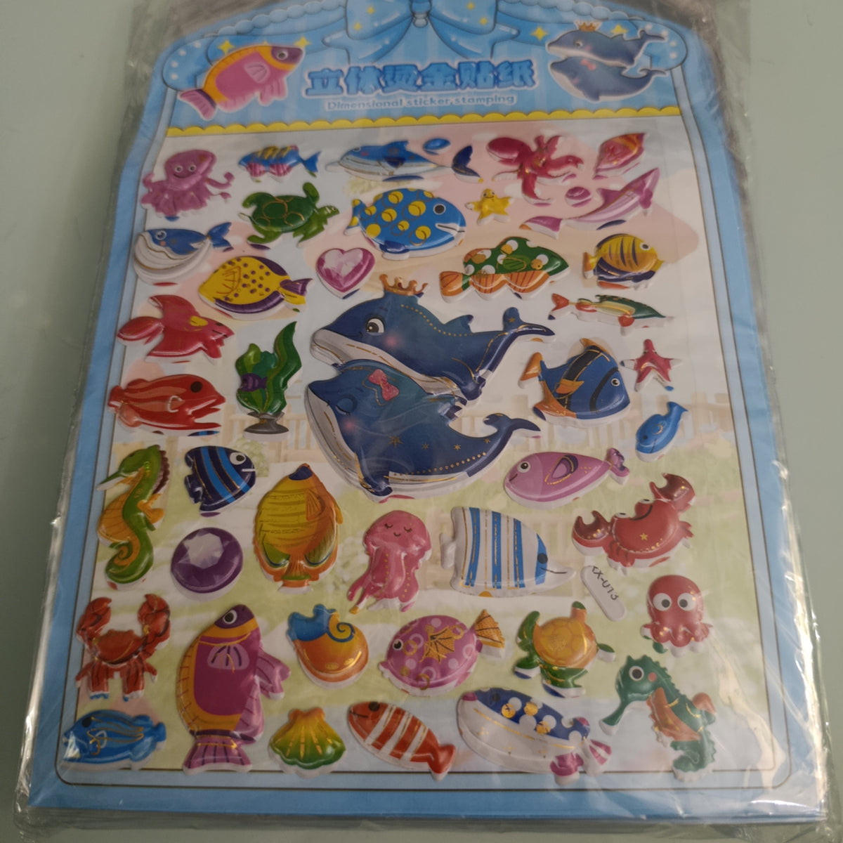 PAQUETE DE STICKERS CON 20 PLANILLAS DE 26X17.5 CM CON SURTIDO DE DISEÑOS POR MAYOREO