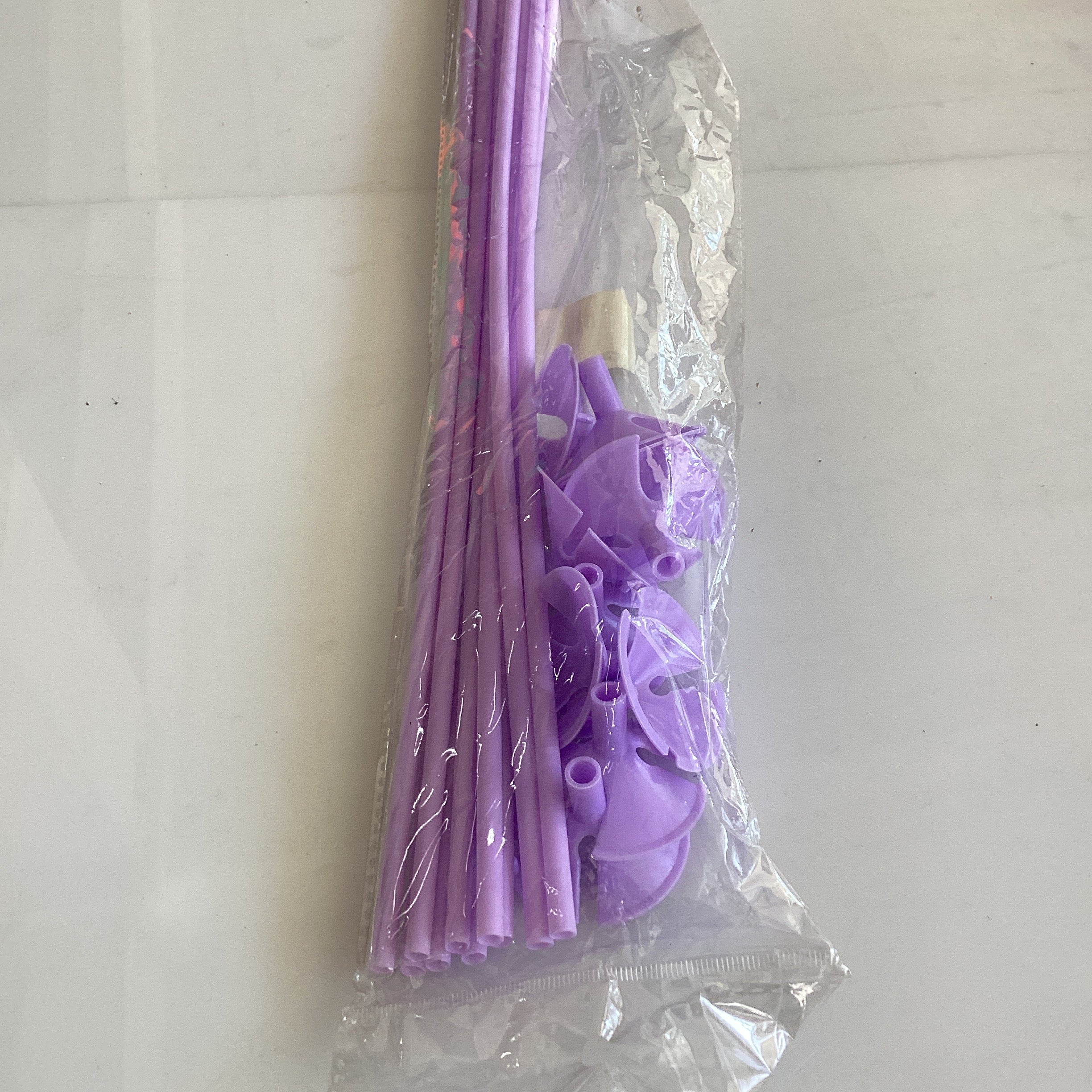 PORTAGLOBOS CON POPOTE DE 42 CM POR MAYOREO