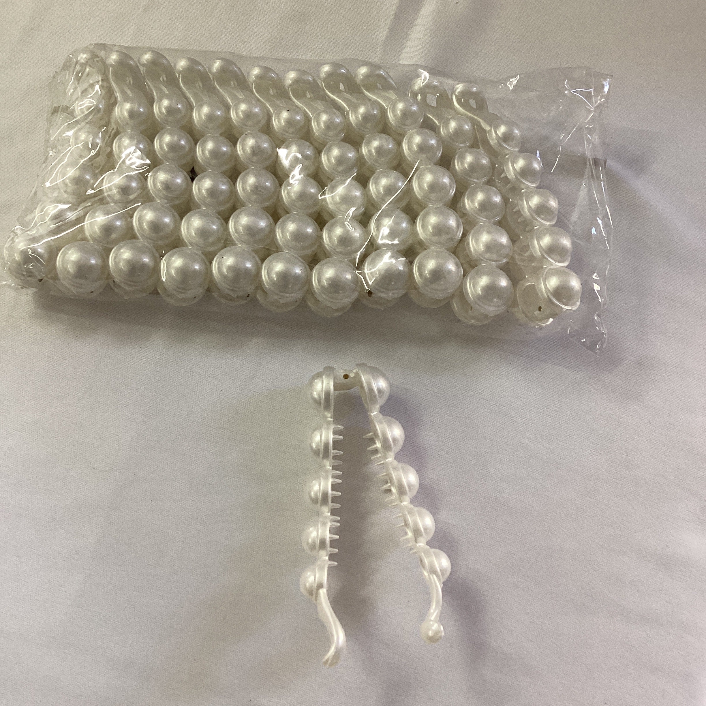 PINZA TIPO BANANA PARA CABELLO 10 CM POR MAYOREO