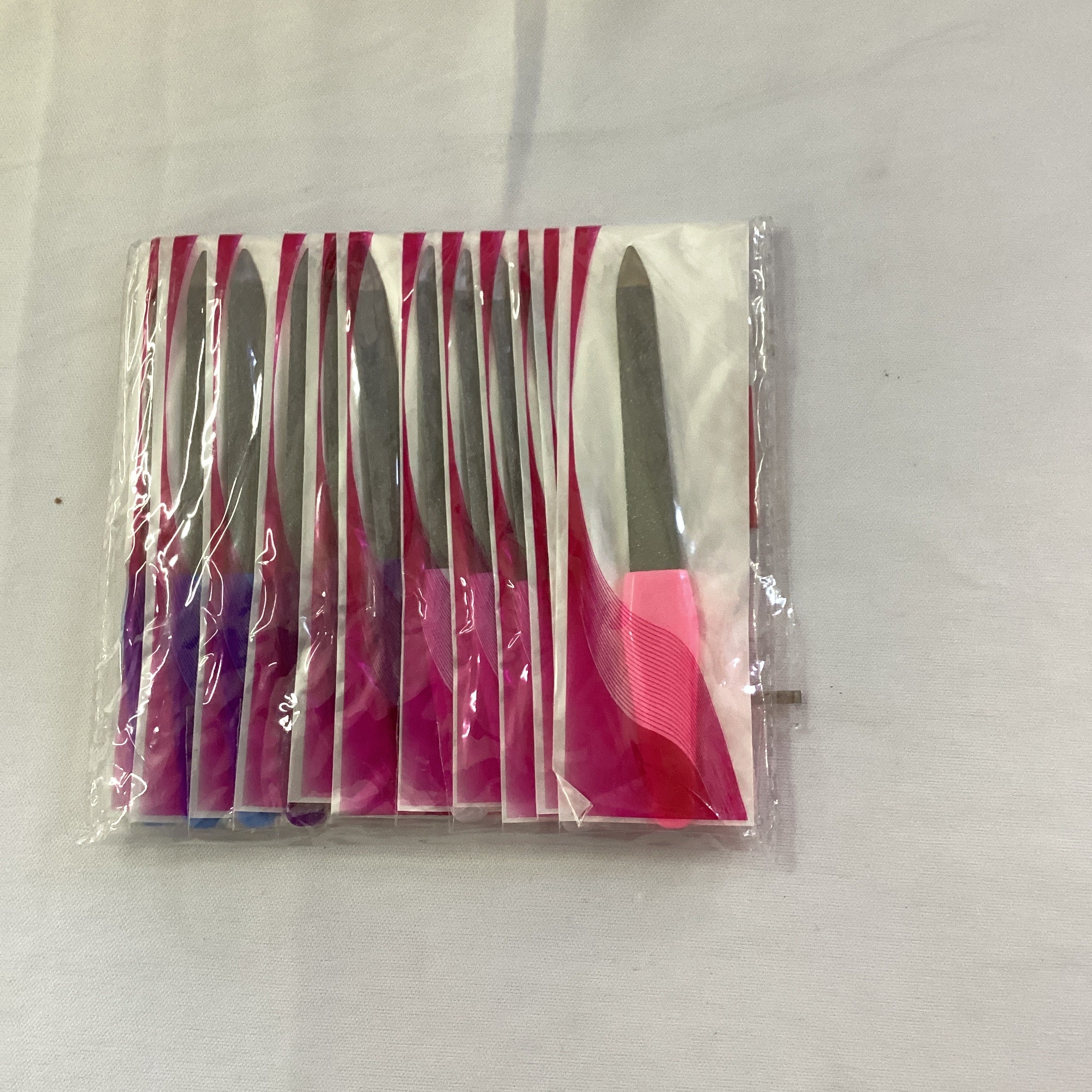 LIMA PARA UÑAS EMBOLSADA INDIVIDUAL SURTIDA EN COLORES POR MAYOREO