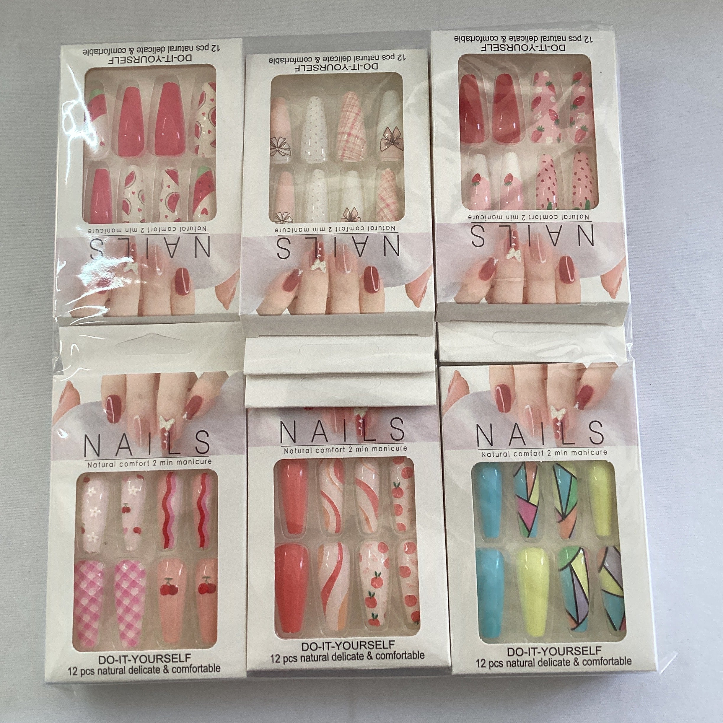 UÑAS NAILS LARGAS DECORADAS SURTIDAS EN DISEÑOS Y COLORES POR MAYOREO