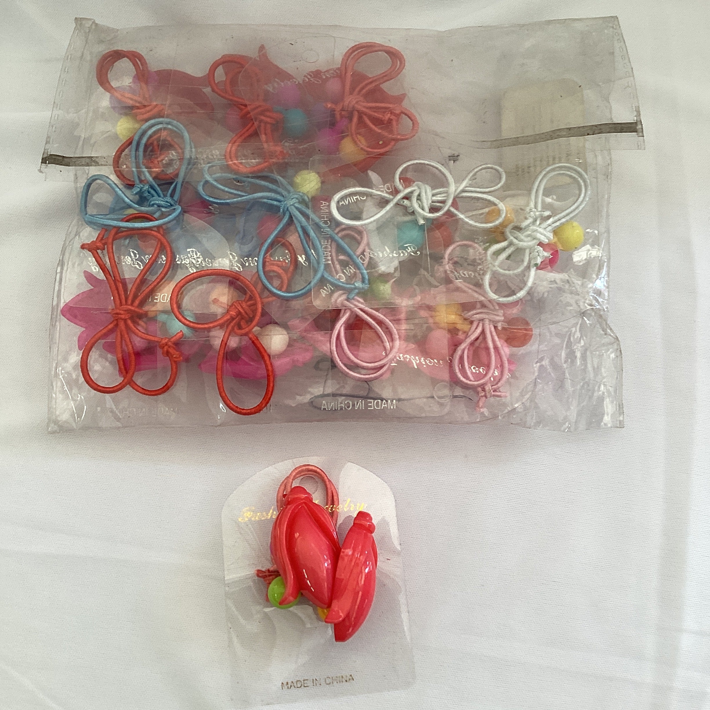 BOLITAS PARA EL CABELLO DECORADAS SURTIDAS EN COLORES