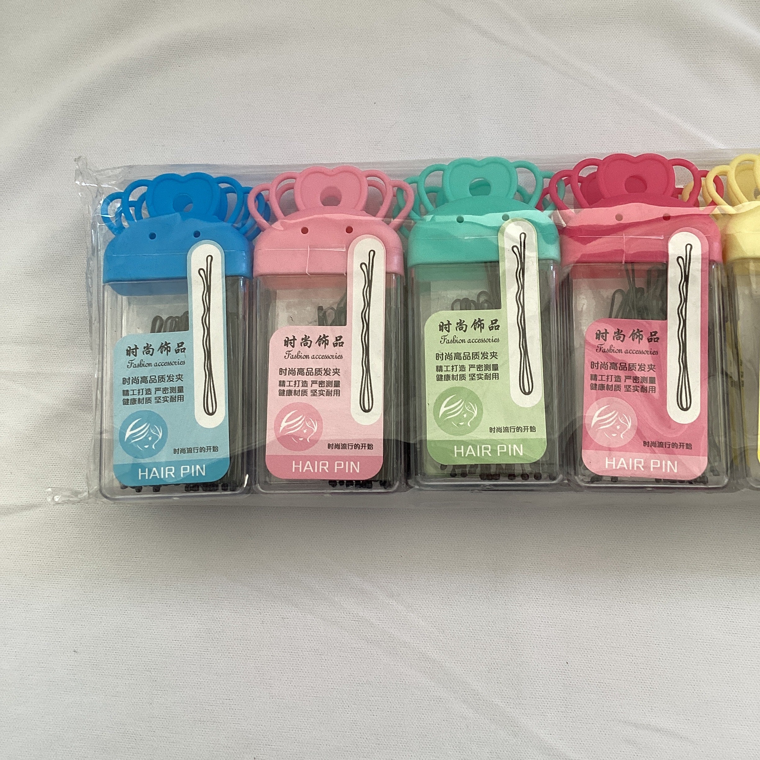 PASADORES PARA EL CABELLO EN ESTUCHE DE PLÁSTICO SURTIDO EN COLORES