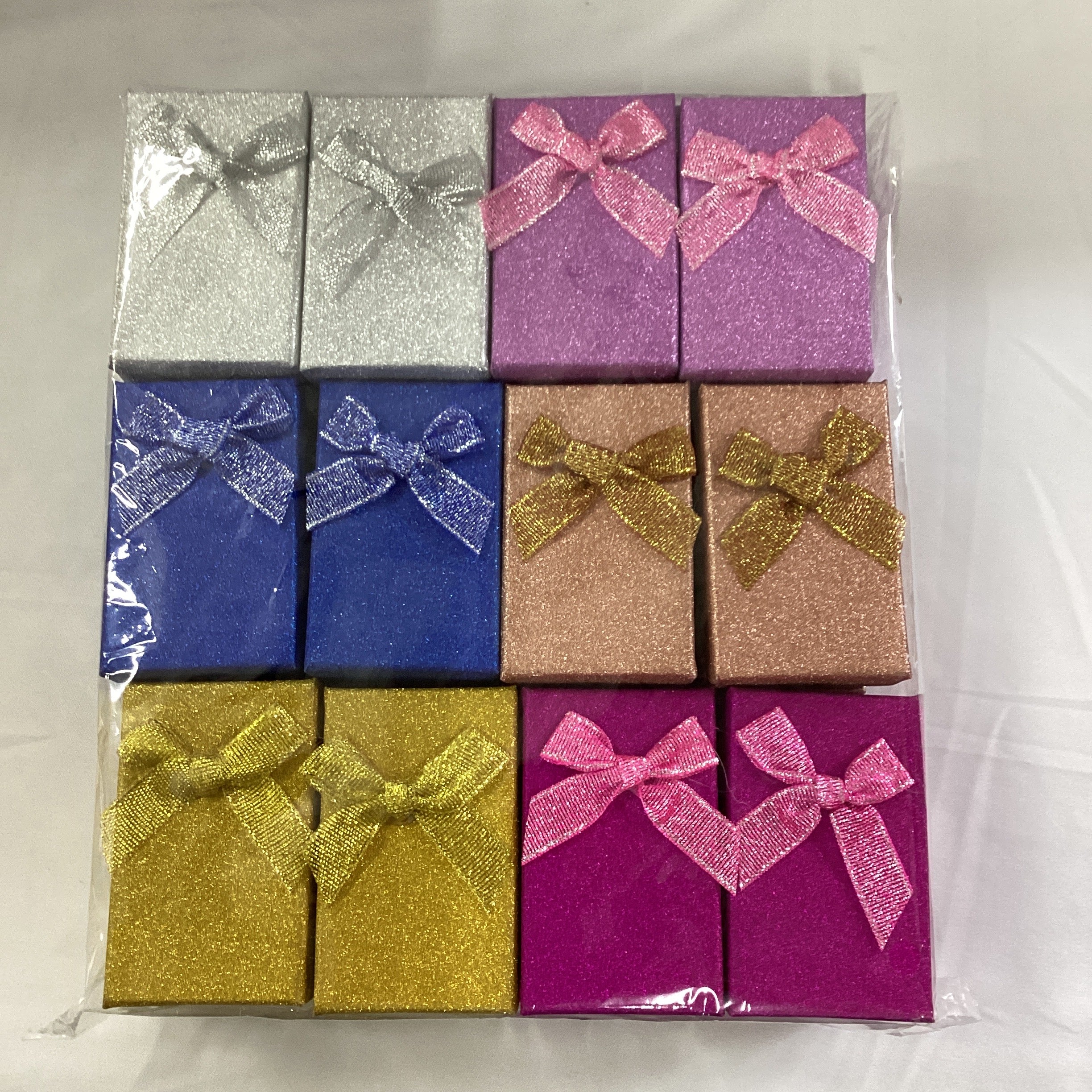 CAJA DE REGALO 8X5 CM SURTIDO EN COLORES POR MAYOREO