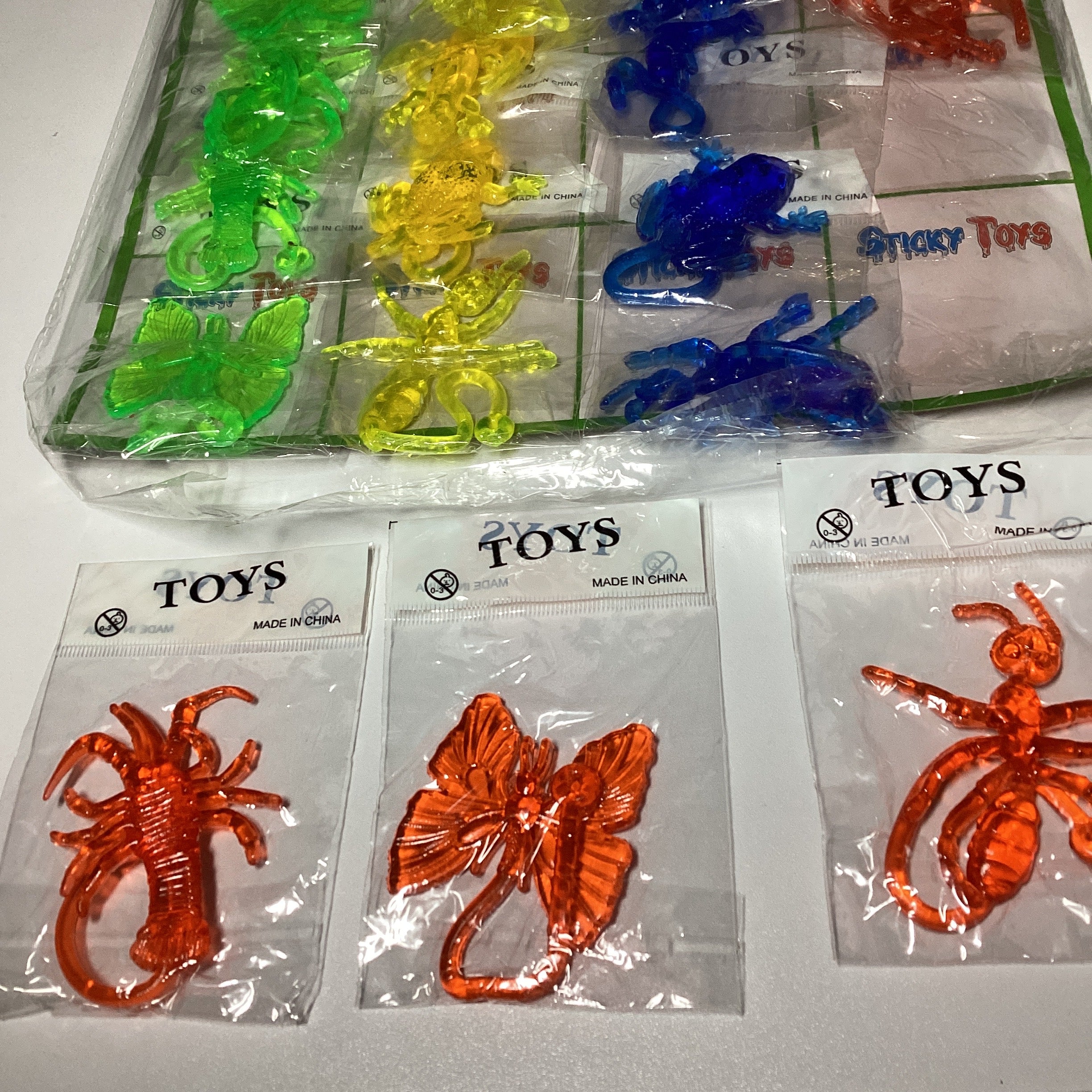 JUGUETE ANIMAL PEGAJOSO EN BLISTER SURTIDO EN DISEÑOS Y COLORES POR MAYOREO