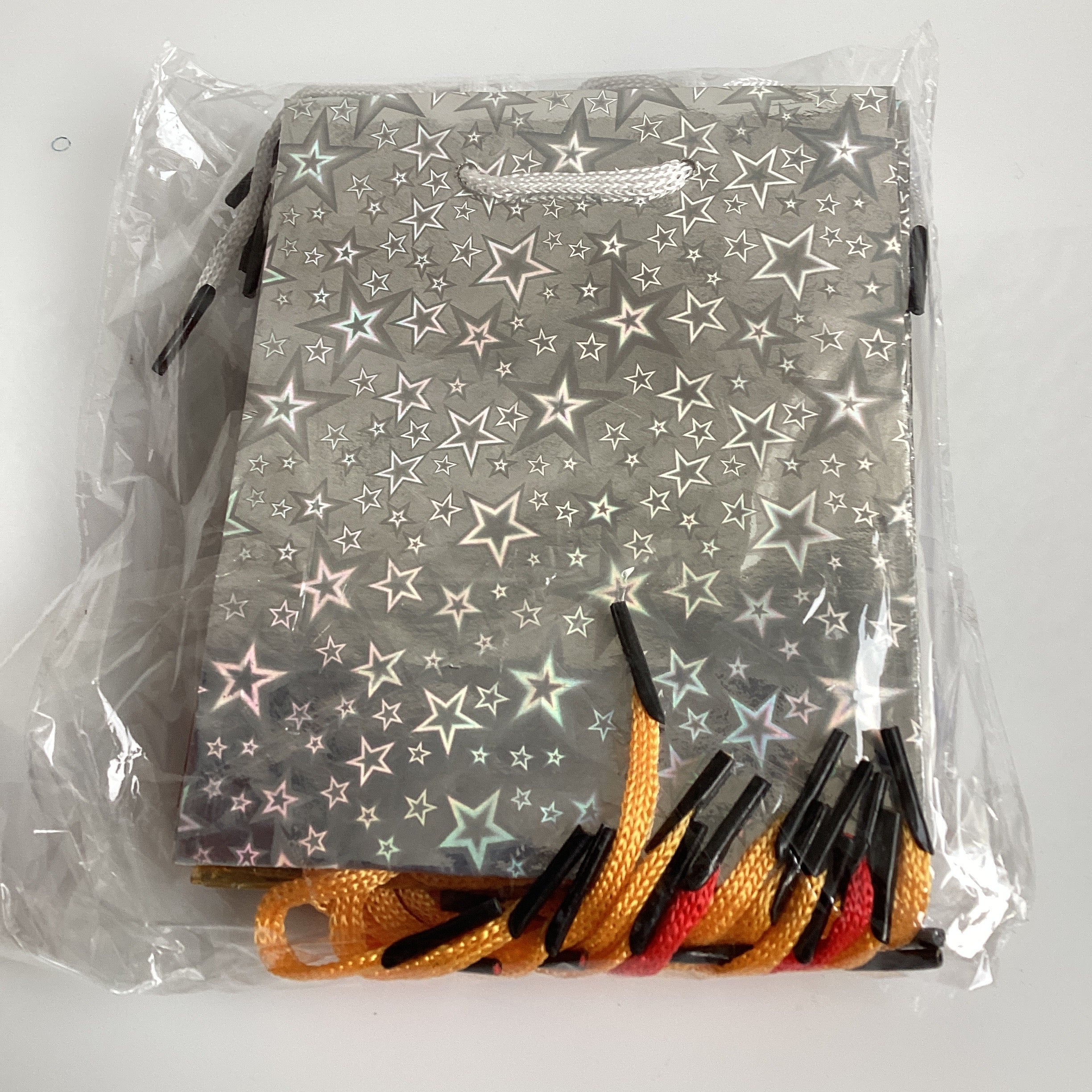 BOLSA METÁLICA MINI 14.5X11.5 CM SURTIDA EN COLORES POR MAYOREO