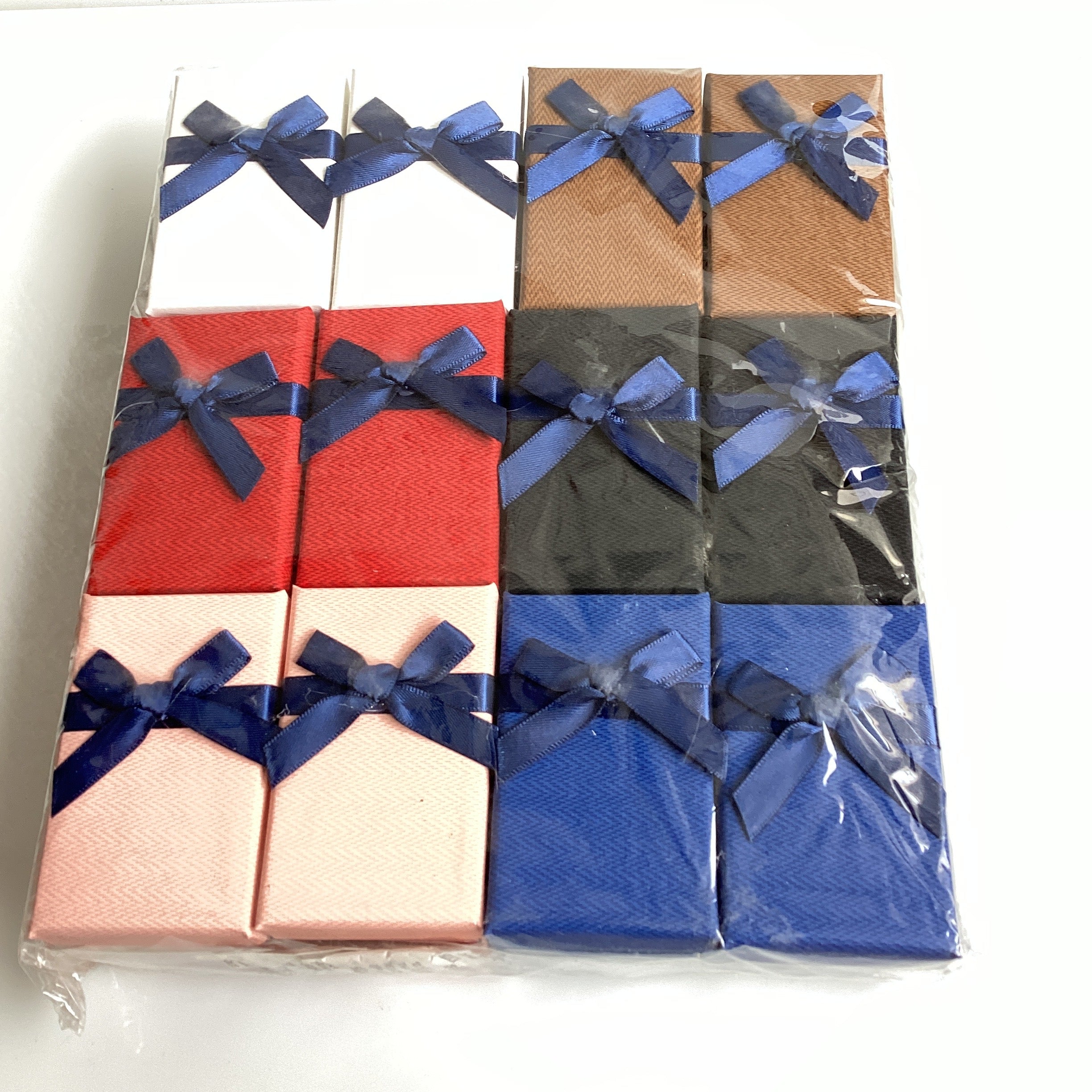CAJITA DE REGALO CON MOÑO 8X5 CM PARA ANILLO PULCERA SURTIDA EN COLORES POR MAYOREO
