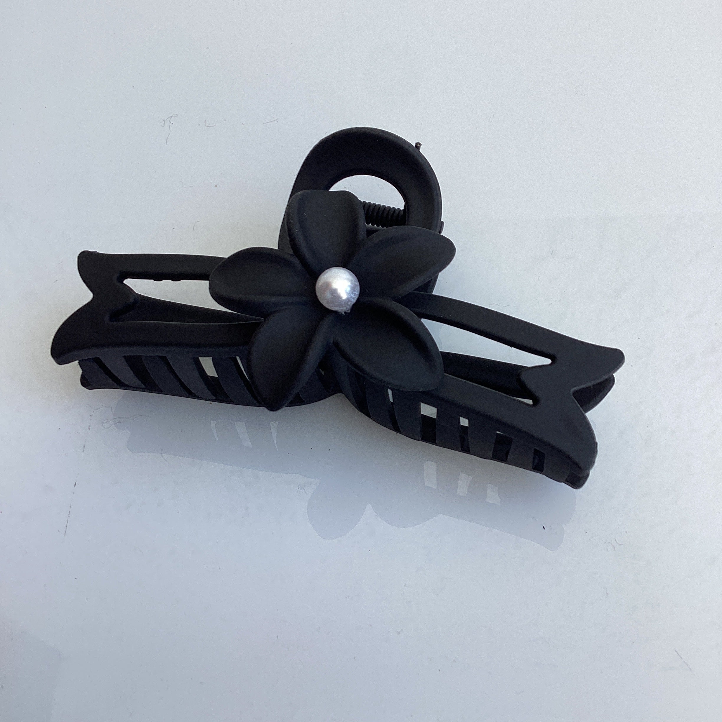 PINZA NEGRA PLÁSTICO PRIMERA CALIDAD DISEÑO 11 CM POR MAYOREO