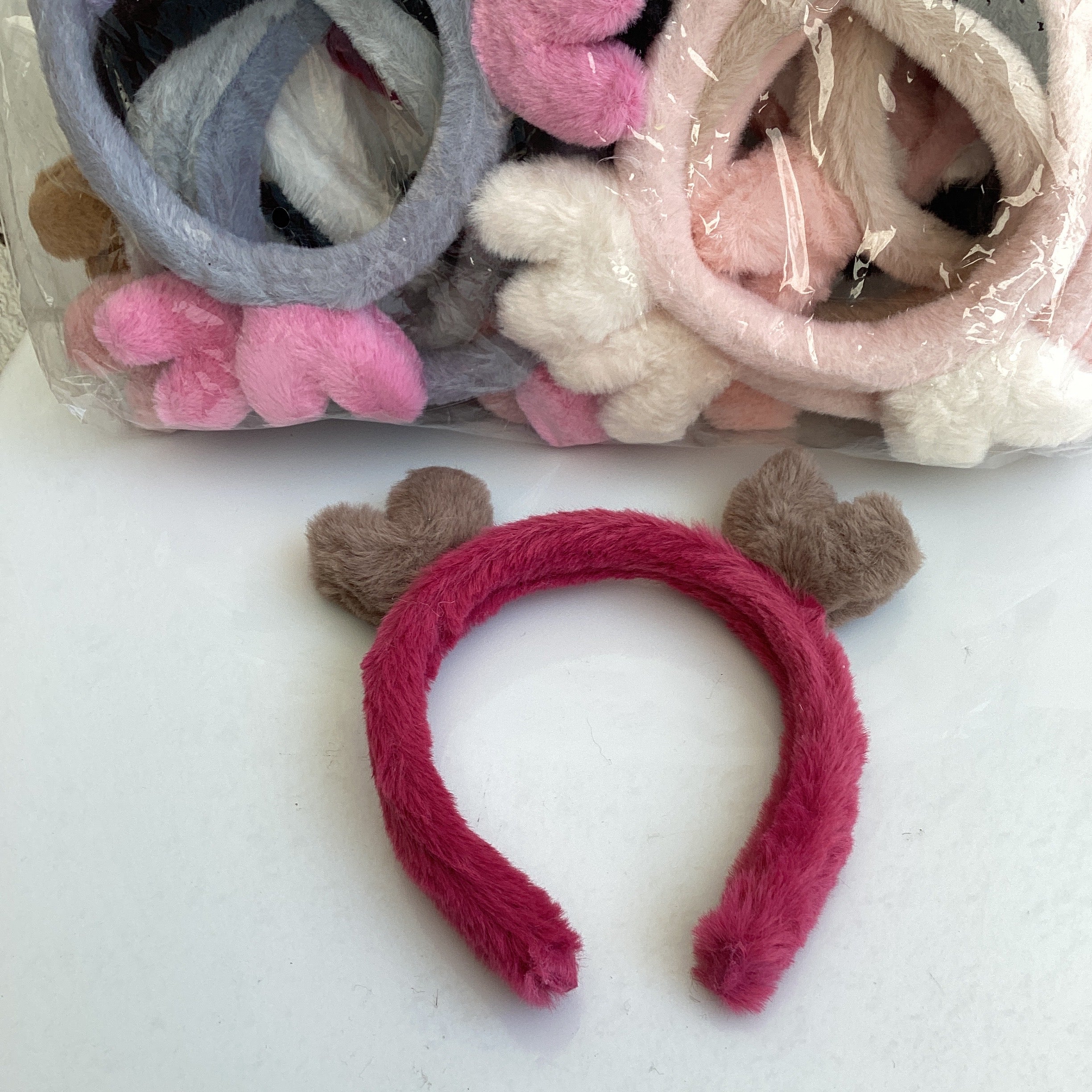 DIADEMA PELUCHE SURTIDO EN COLORES PASTEL DISEÑO OREJITAS POR MAYOREO