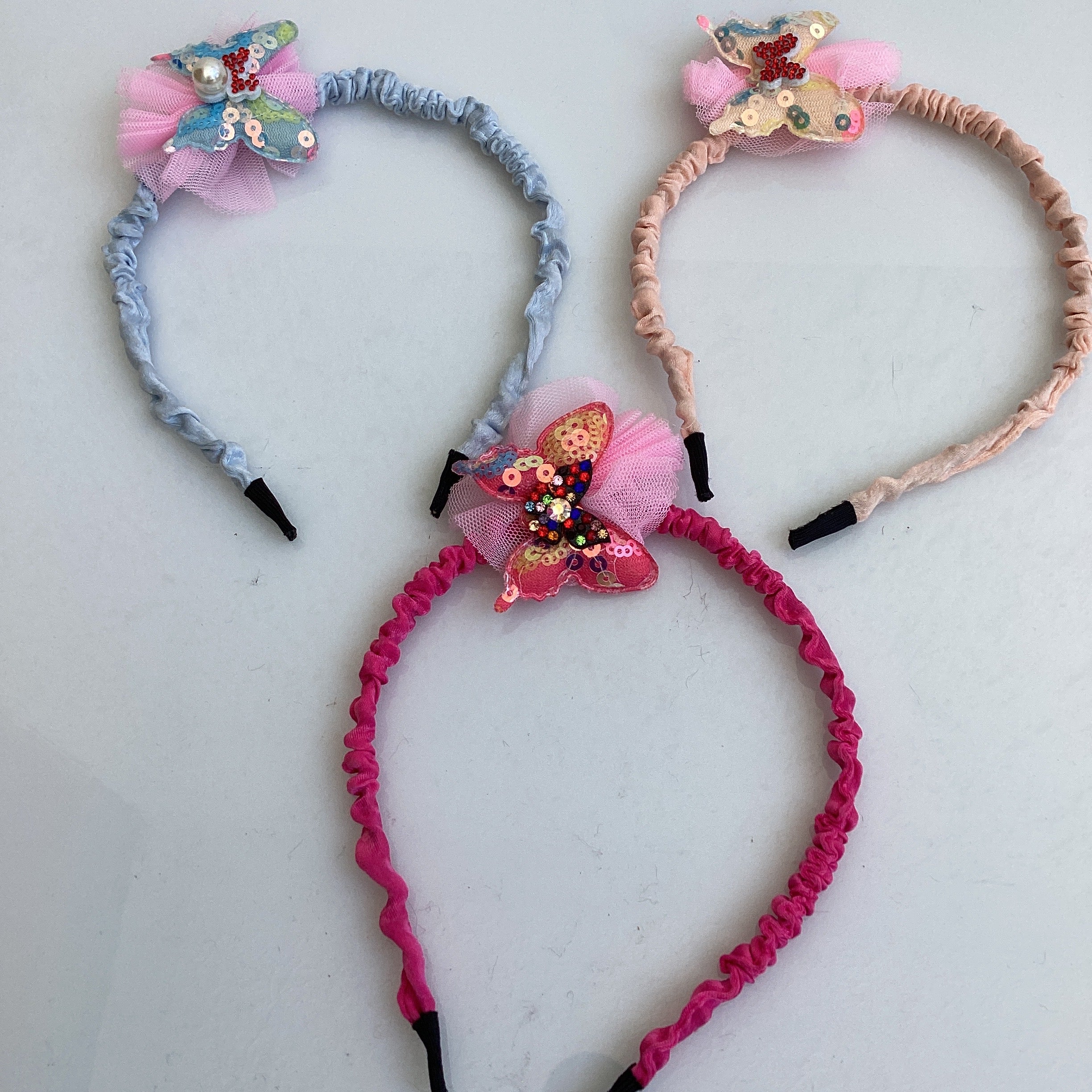DIADEMA TELA SURTIDA EN DISEÑOS Y COLORES POR MAYOREO