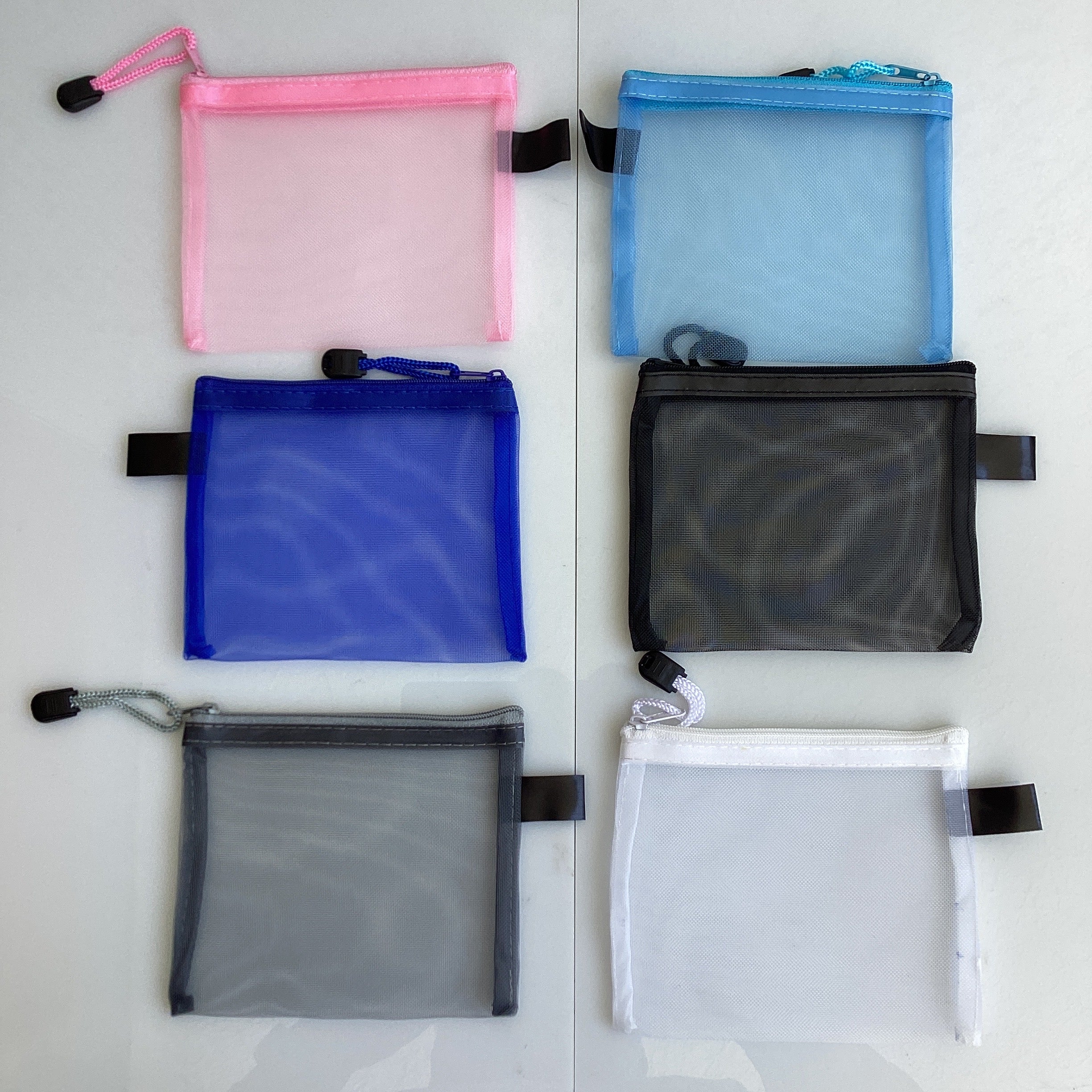 BOLSITA MULTIUSOS TRANSPARENTE CON CIERRE 14X12 SURTIDA EN COLORES POR MAYOREO
