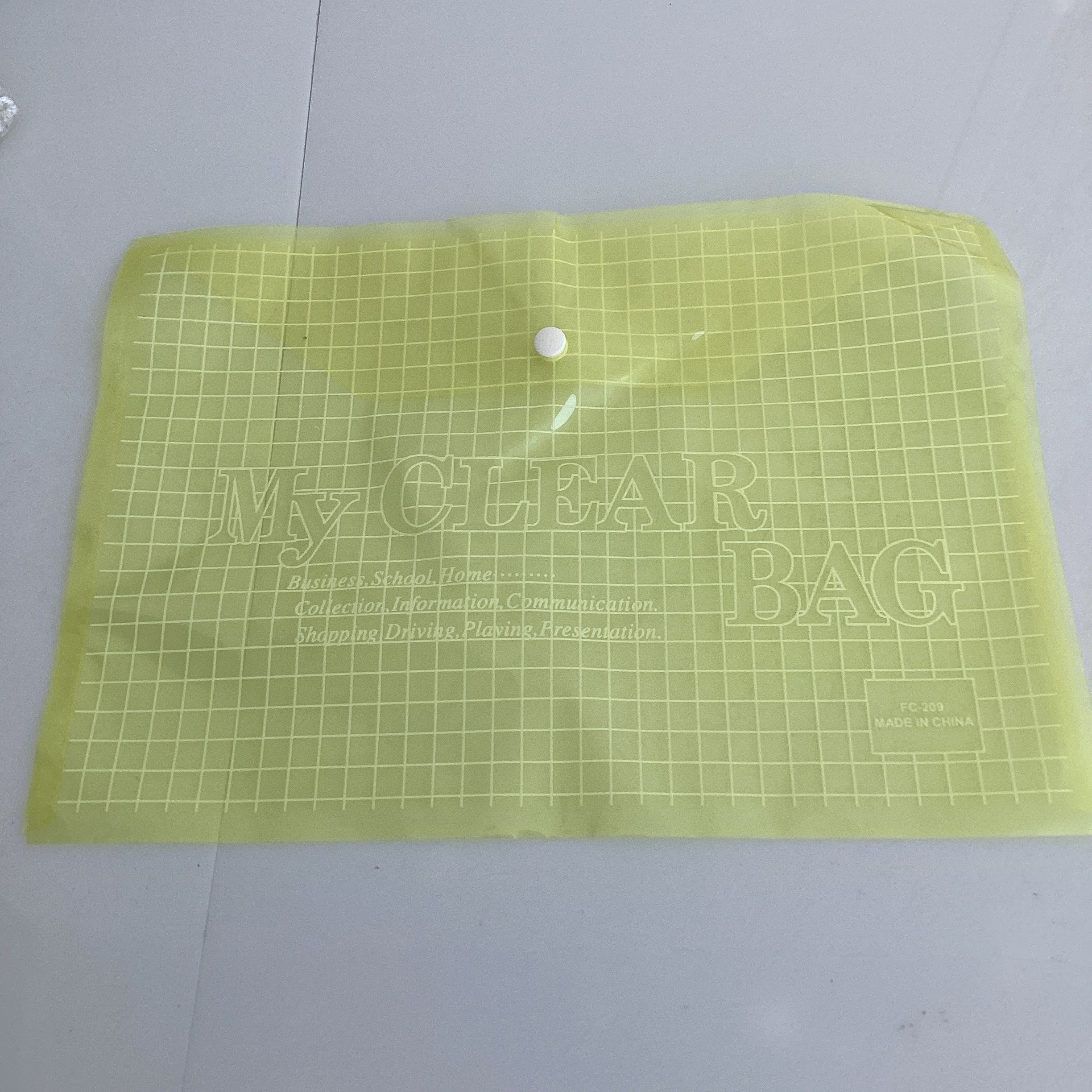 FOLDER DE PLÁSTICO TAMAÑO OFICIO CON BOTON COLORES POR MAYOREO