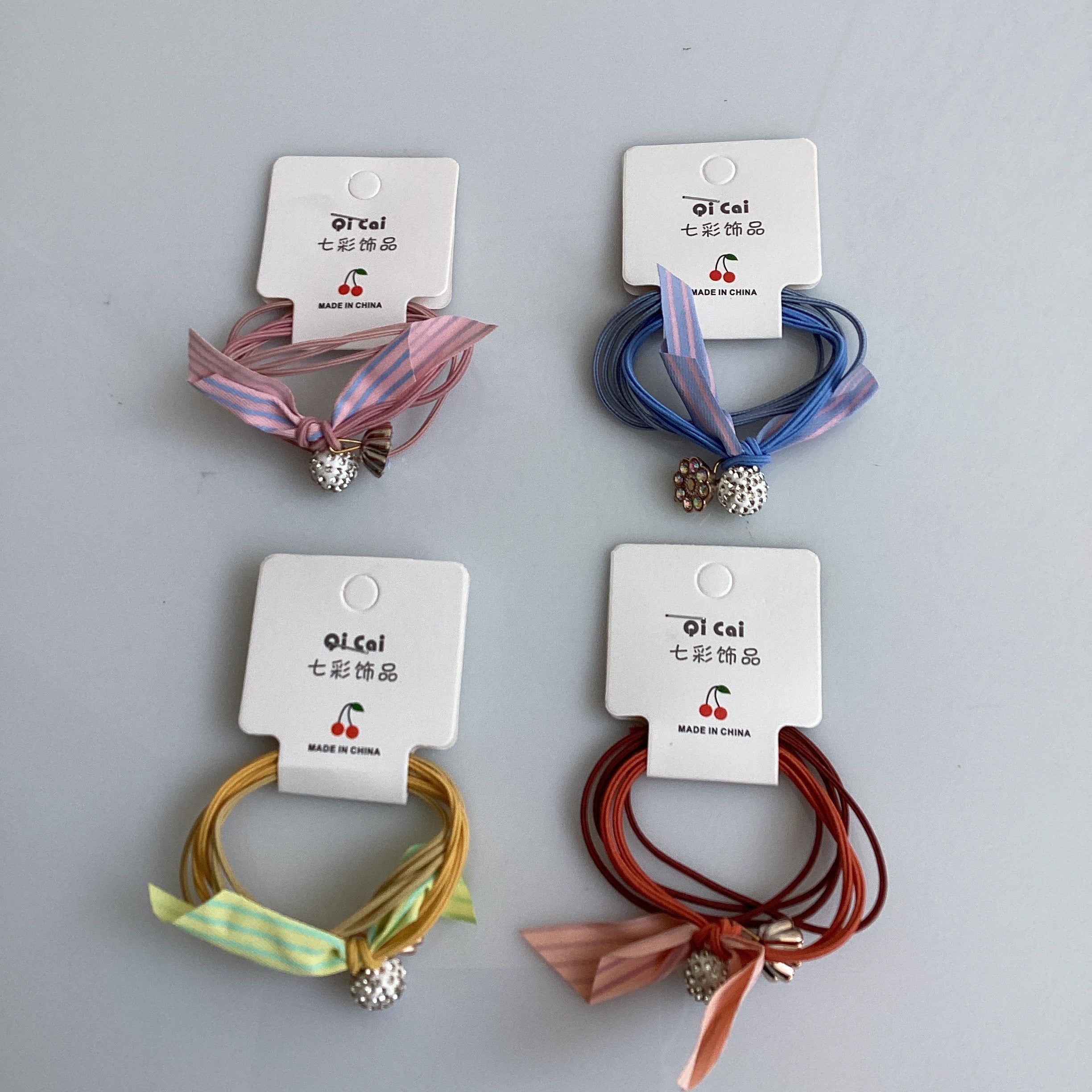 LIGAS PARA EL CABELLO SURTIDA EN COLORES POR MAYOREO