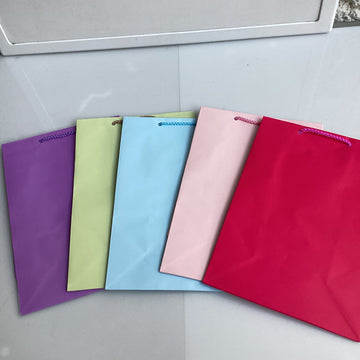 BOLSA MEDIANA 28X19 CM COLORES PASTEL SURTIDOS POR MAYOREO