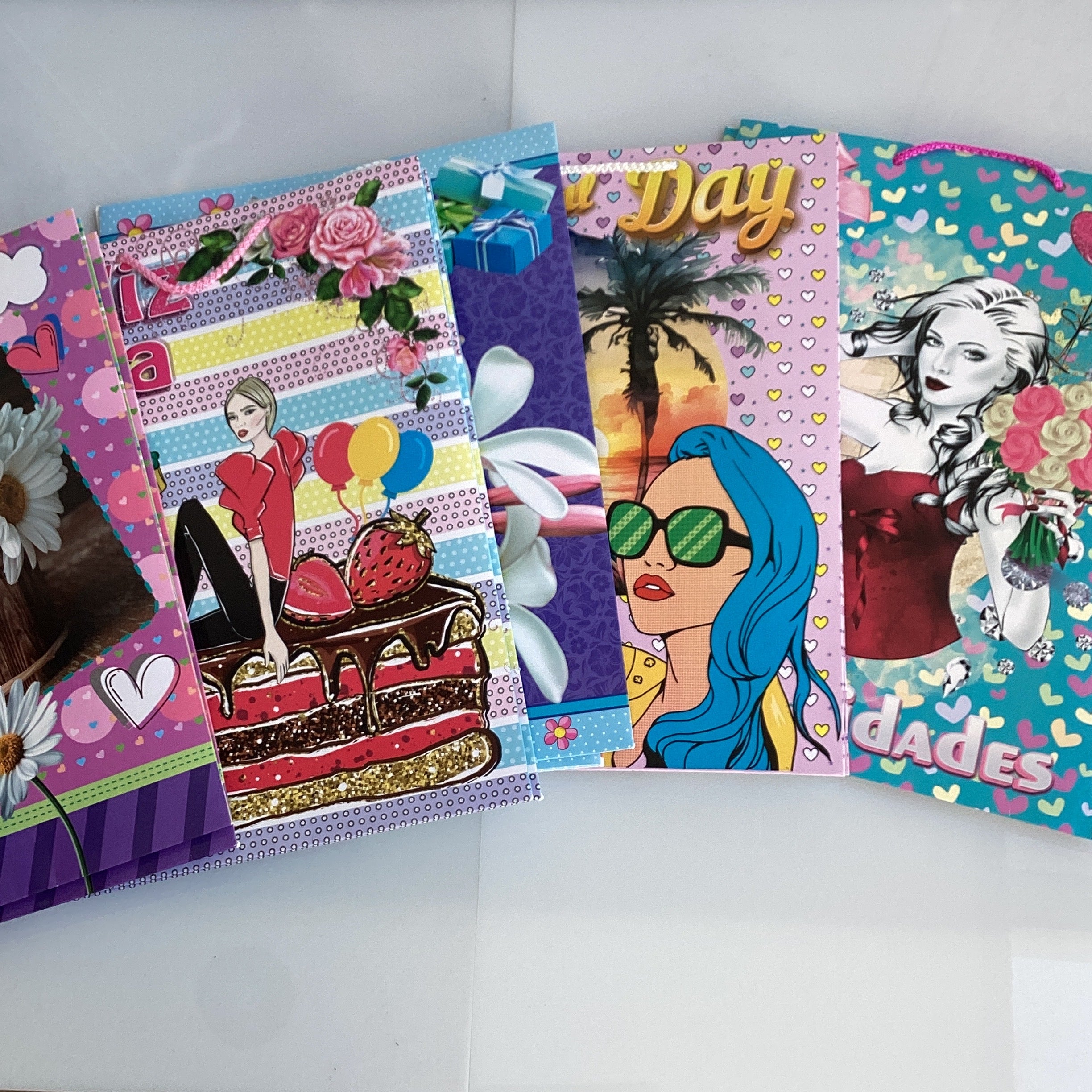 BOLSA GRANDE SULFATADA 32X24 CM SURTIDA EN DISEÑOS DE DAMA POR MAYOREO