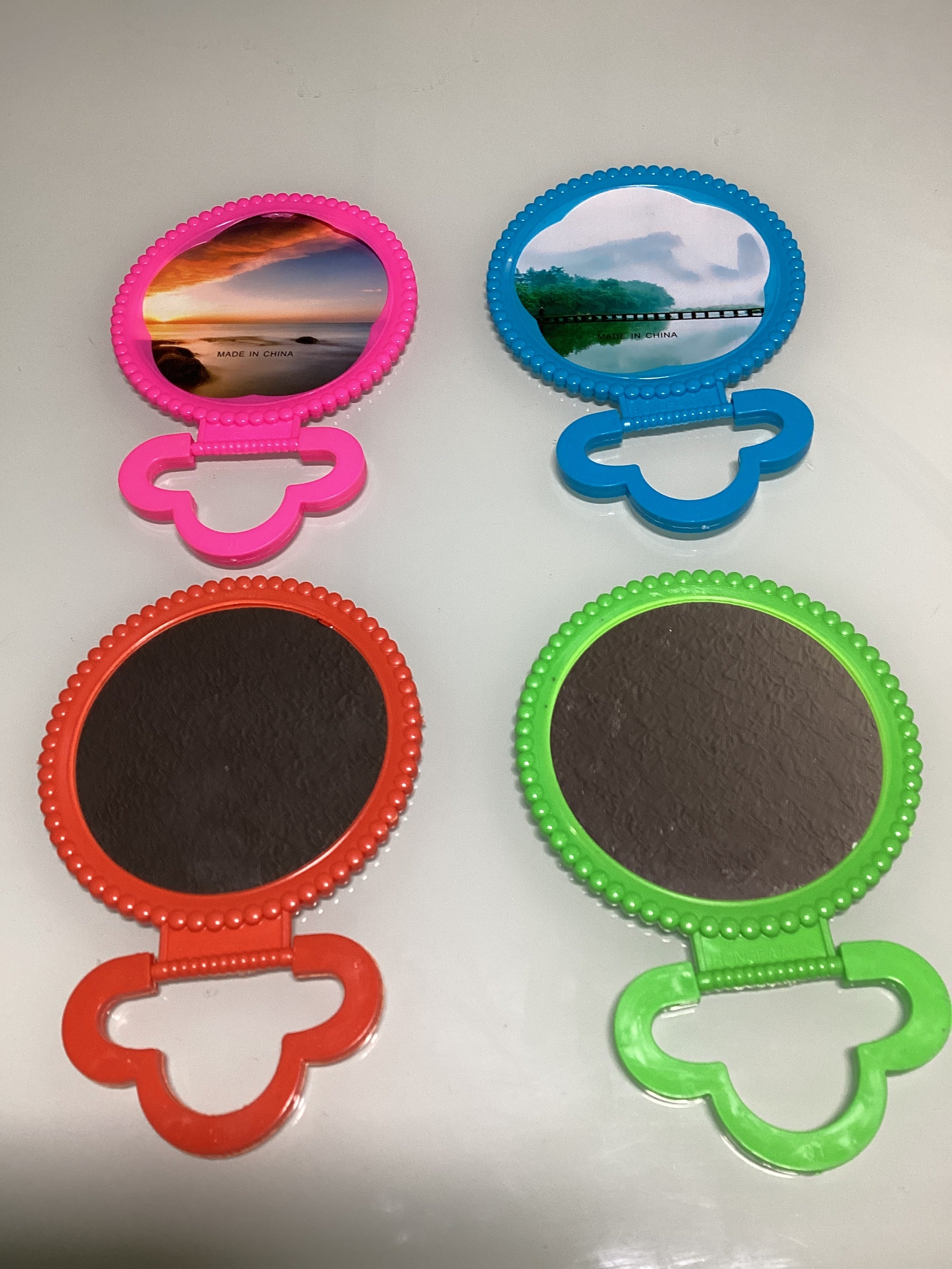ESPEJO REDONDO SURTIDO EN COLORES 17 CM POR MAYOREO