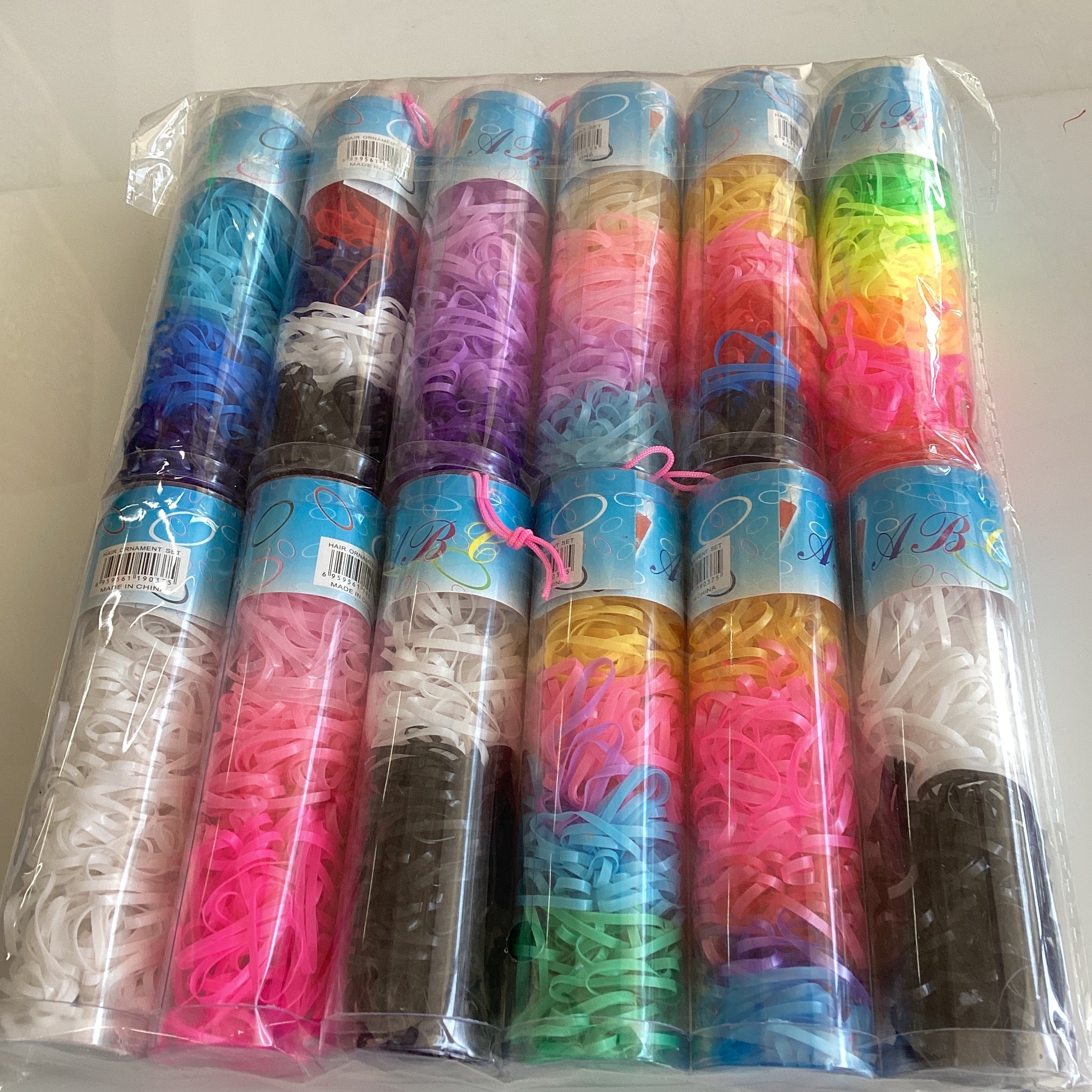 LIGA LATEX EN TUBO 13.6X3.9 CM SURTIDA EN COLORES POR MAYOREO