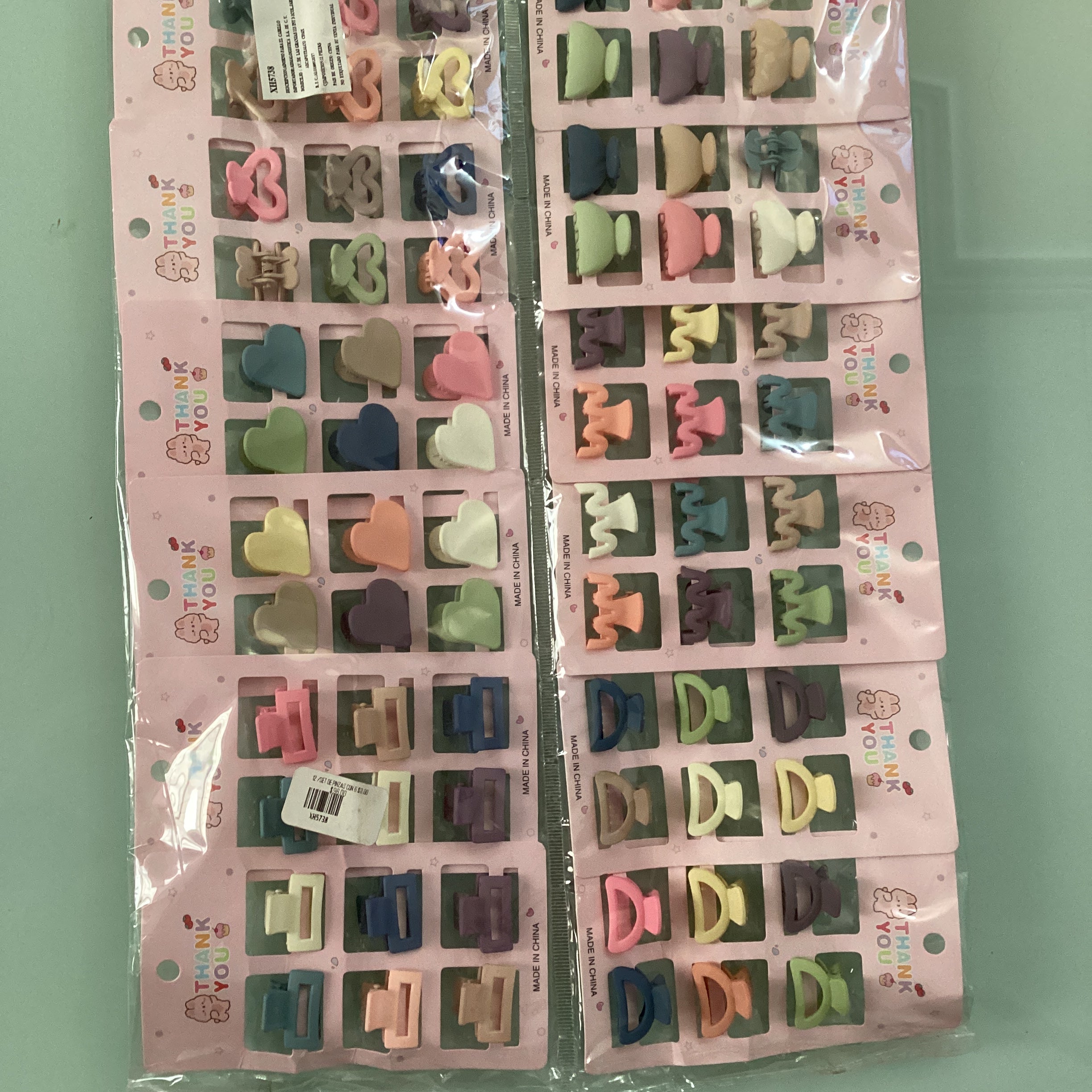 SET DE PINZAS MINI 2 CM SURTIDAS EN DISEÑOS Y COLORES POR MAYOREO