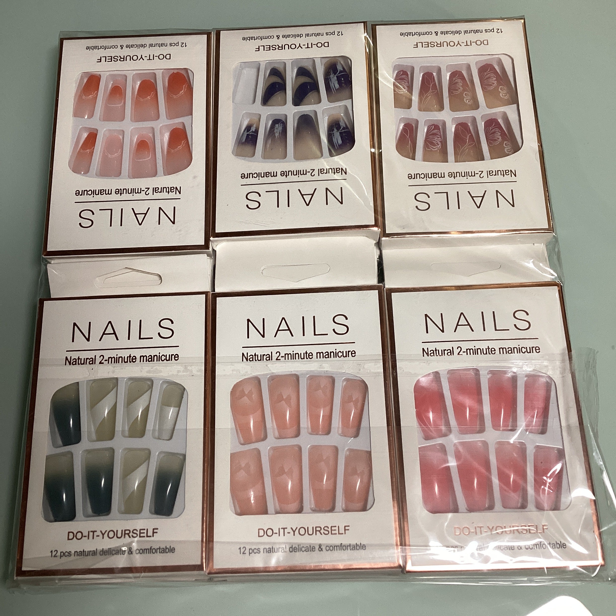 UÑAS POSTIZAS NAILS NATURAL2 CON PEGAMENTO SURTIDA EN COLORES NATURALES CON DISEÑOS POR MAYOREO