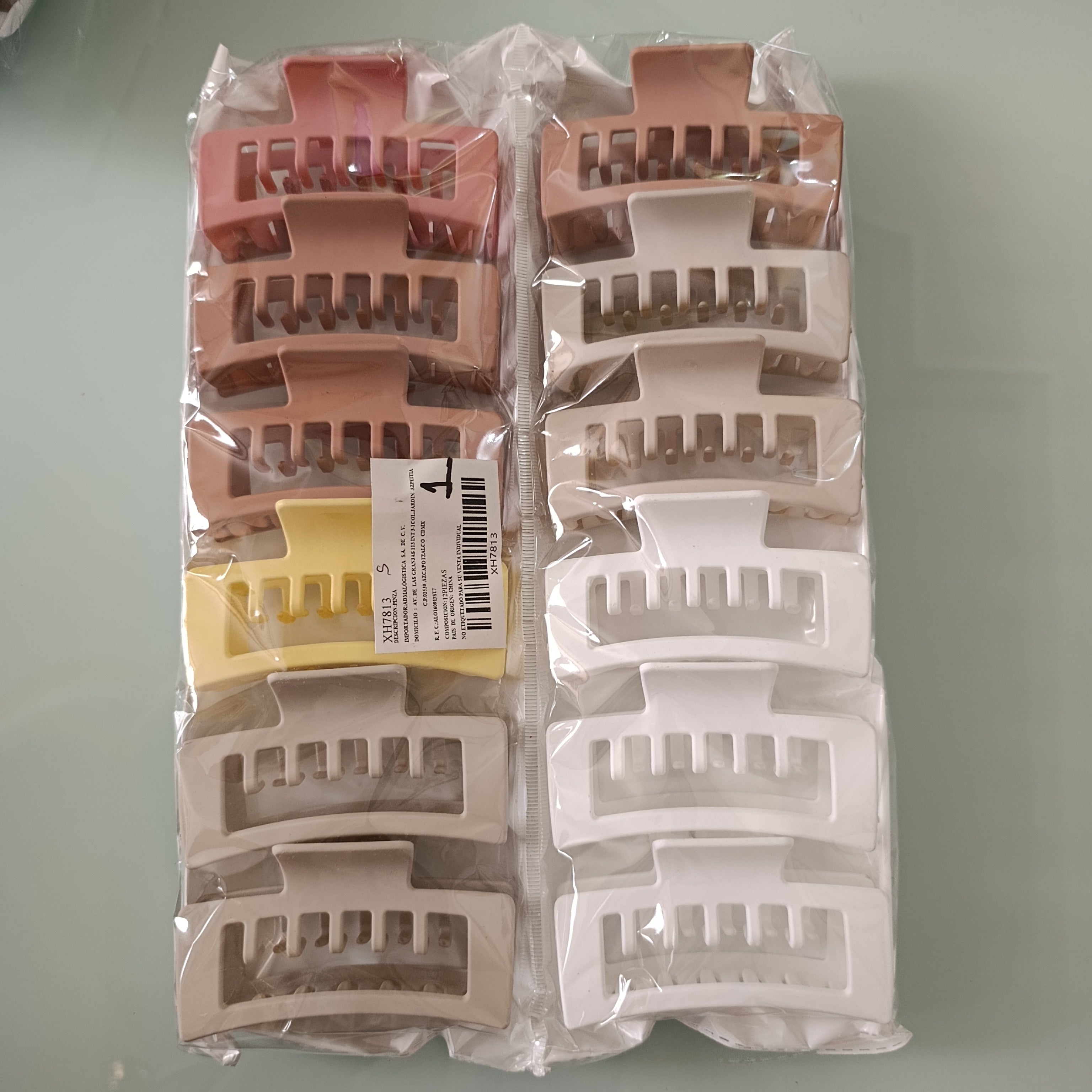PINZA PARA CABELLO DE PLASTICO RESISTENTE DE 10 CM SURTIDO EN COLORES POR MAYOREO