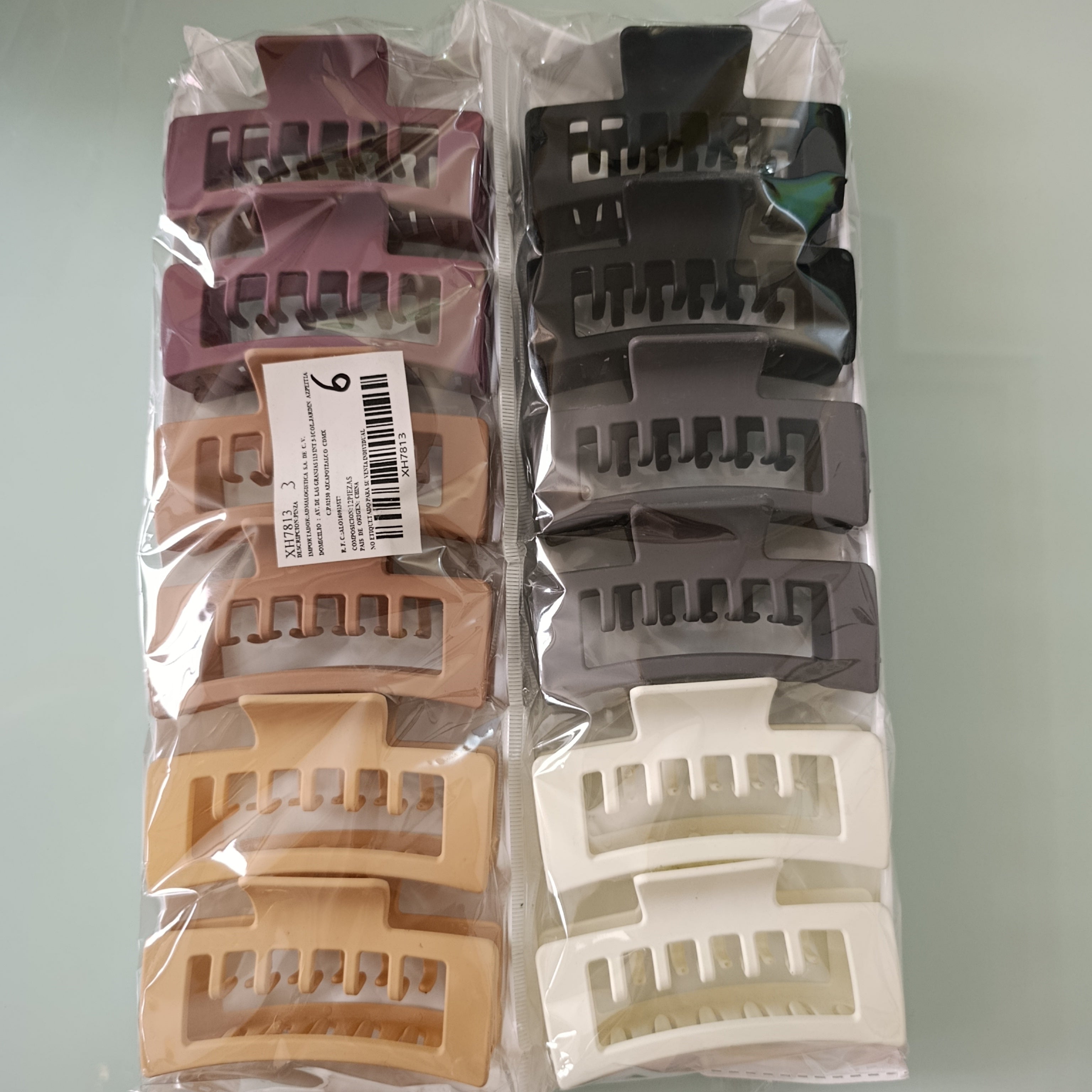 PINZA PARA CABELLO DE PLASTICO RESISTENTE DE 10 CM SURTIDO EN COLORES POR MAYOREO