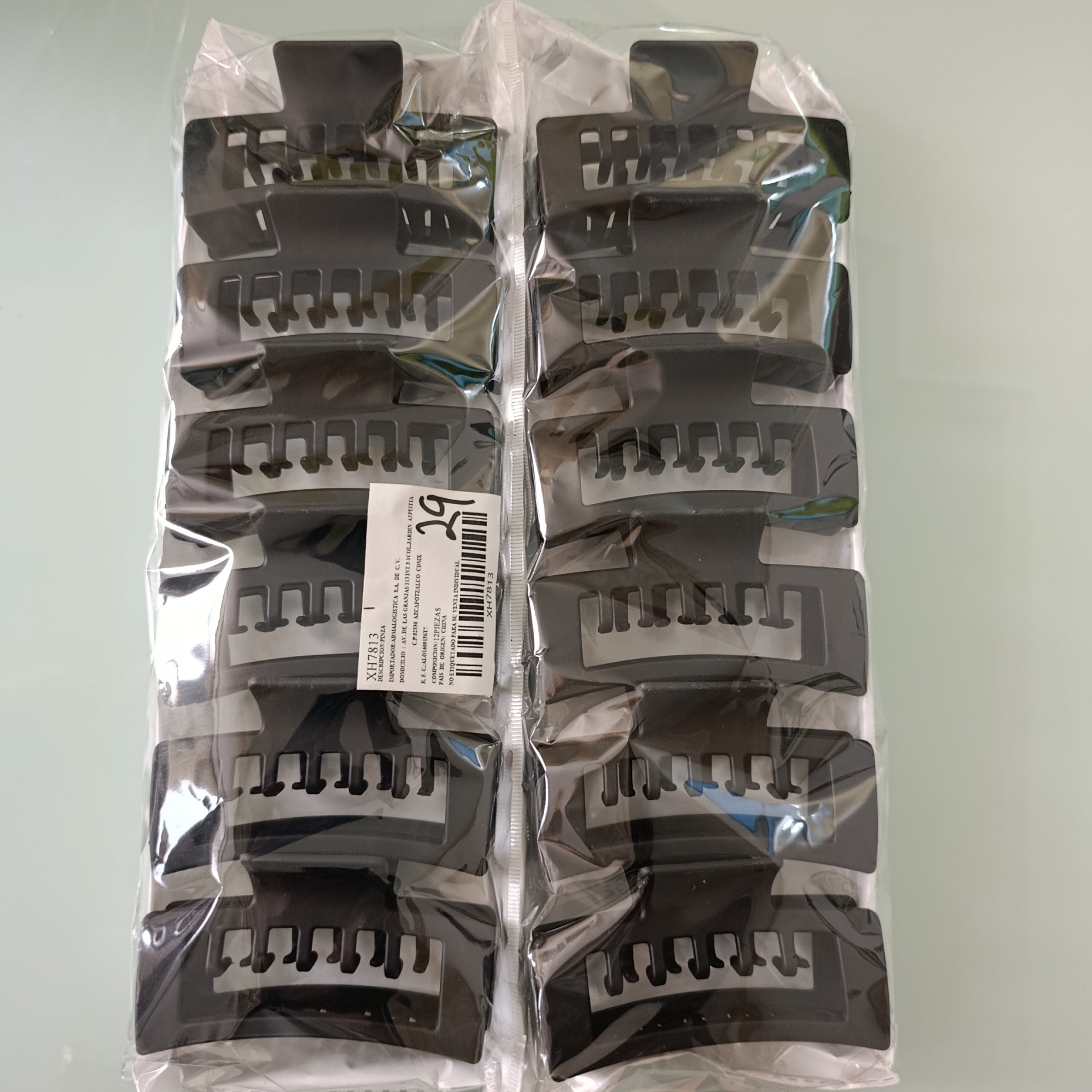 PINZA PARA CABELLO DE PLASTICO RESISTENTE DE 10 CM SURTIDO EN COLORES POR MAYOREO