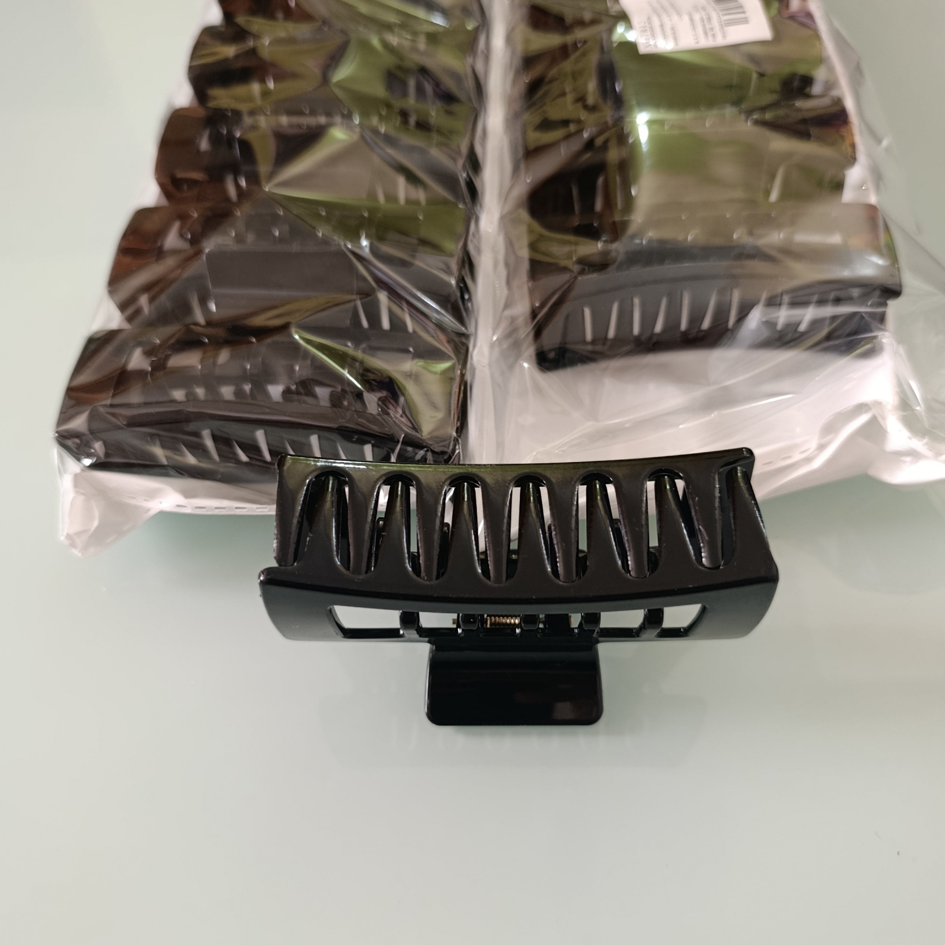 PINZA DE PLASTICO PARA EL CABELLO DE 10 CM POR MAYOREO