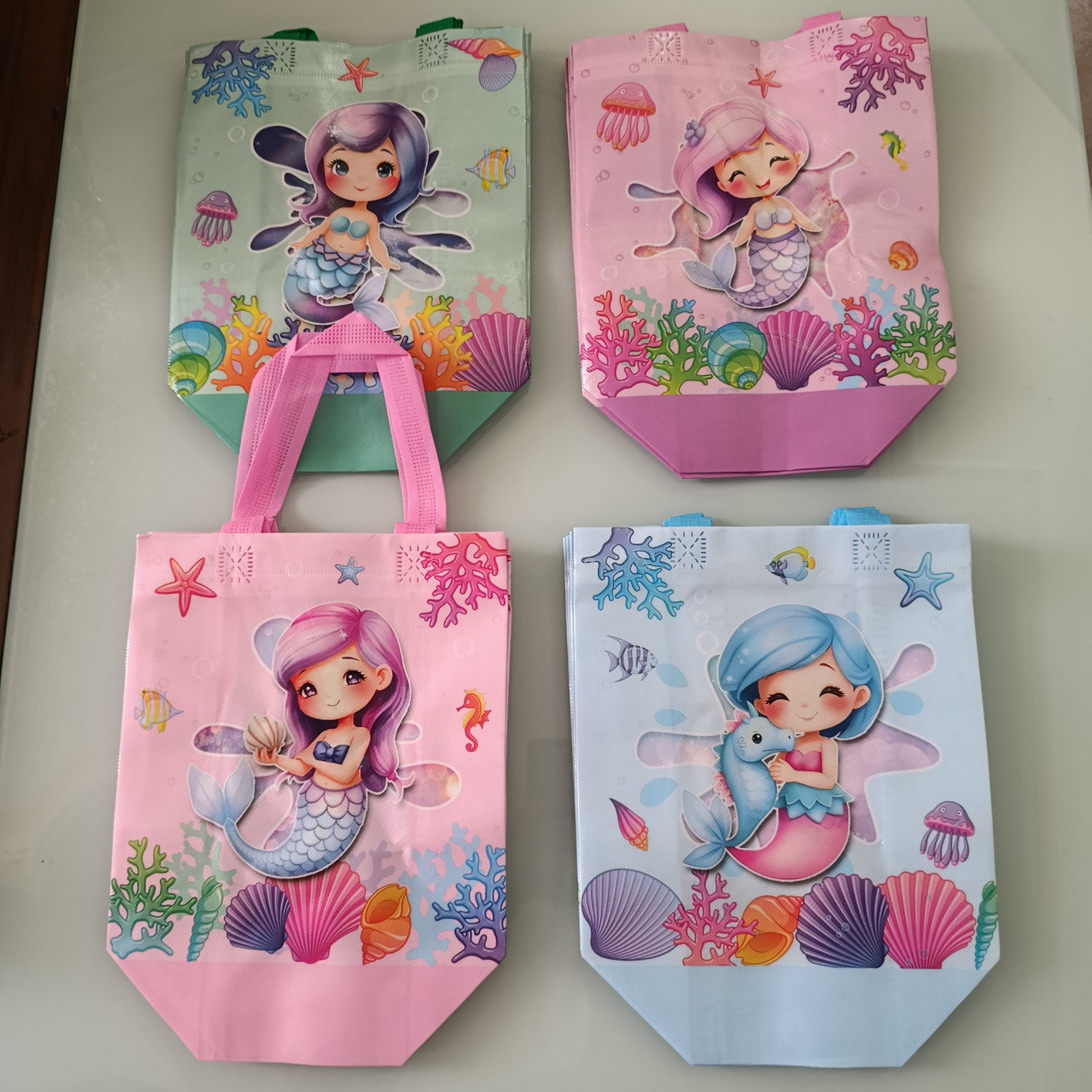 BOLSA DE PROPILENO DE 22X29 CM ESTAMPADA EN DISEÑOS Y COLORES  SURTIDOS POR MAYOREO