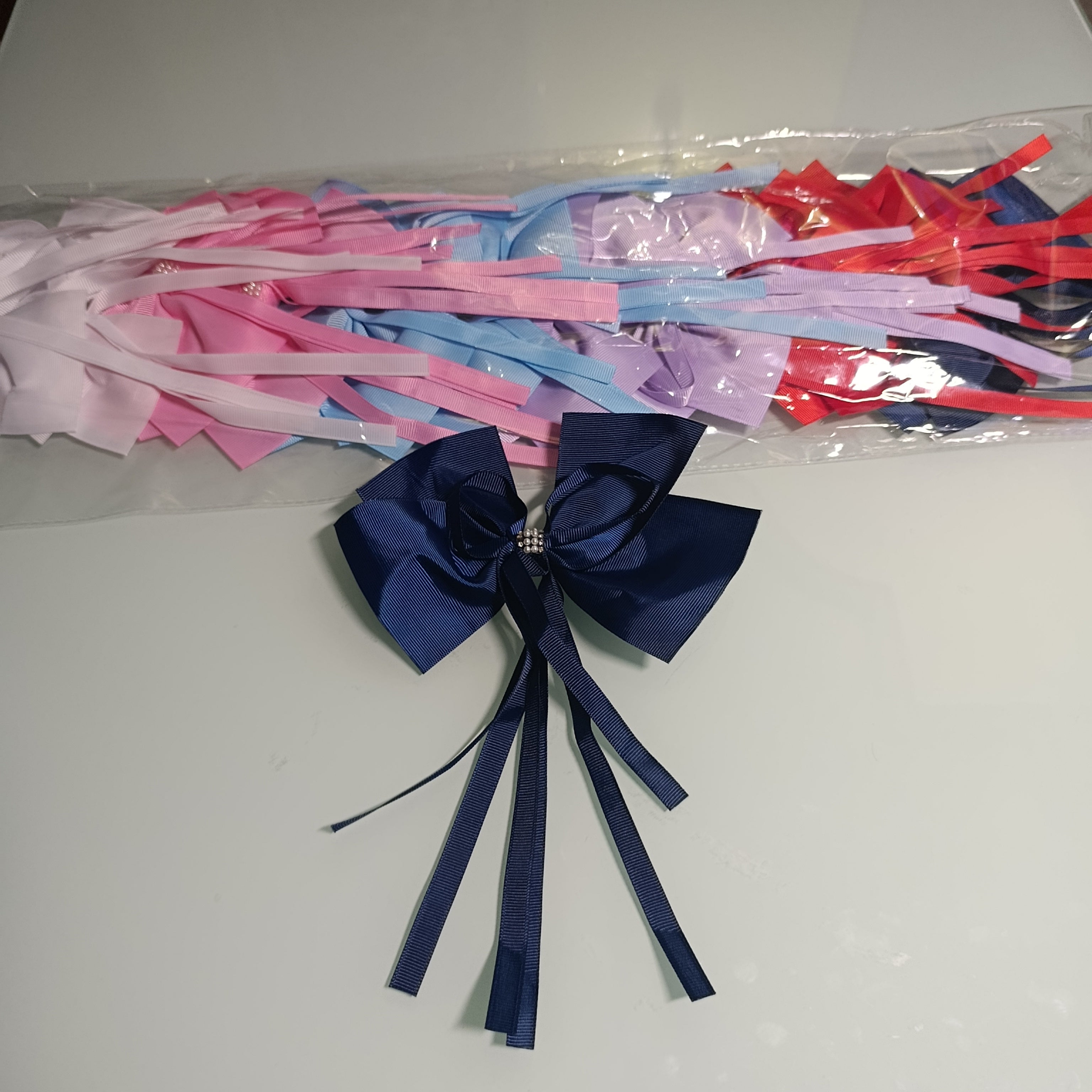 MOÑO DE LISTON PARA EL CABELLO 16 CM SURTIDO EN COLORES POR MAYOREO