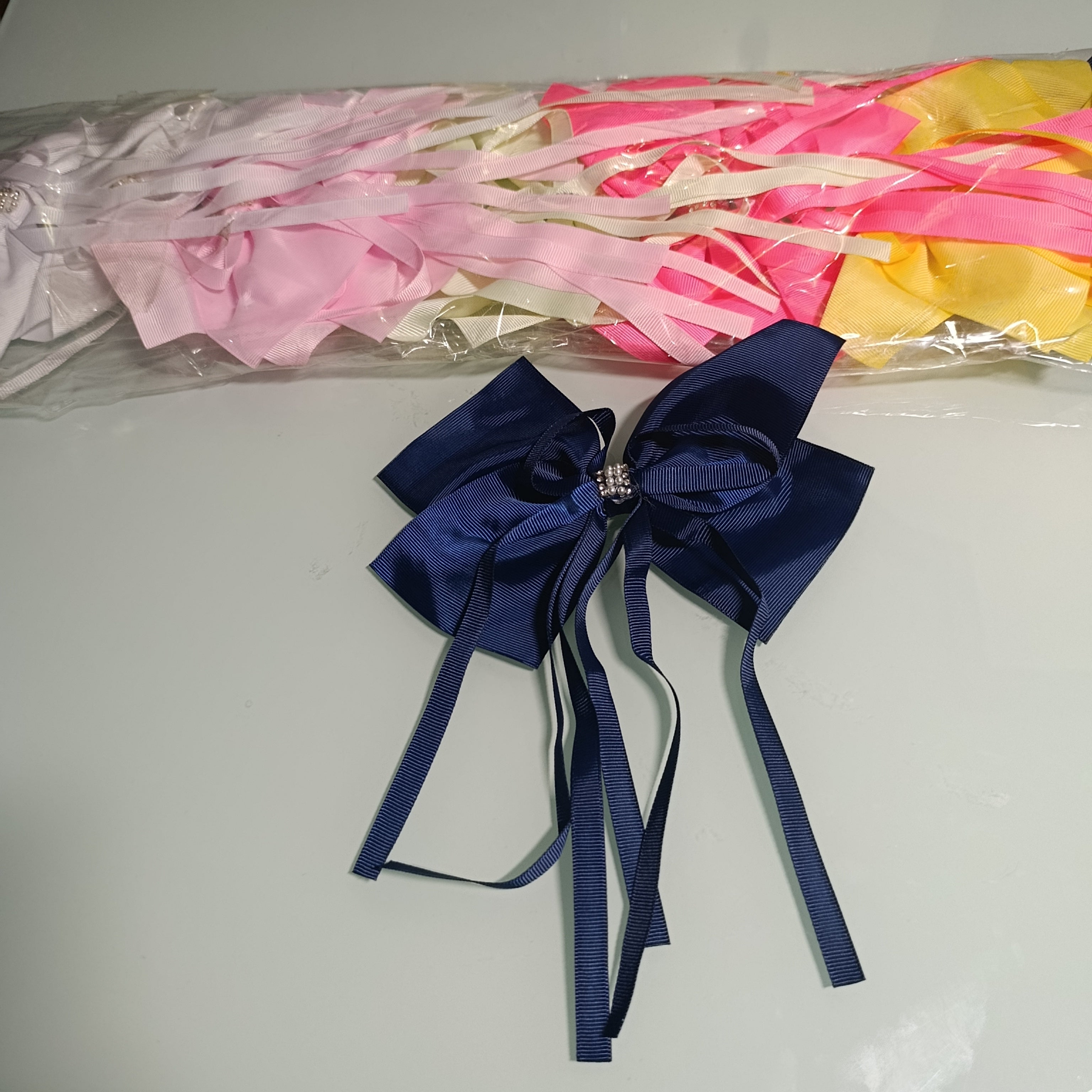 MOÑO DE LISTON PARA EL CABELLO 16 CM SURTIDO EN COLORES POR MAYOREO