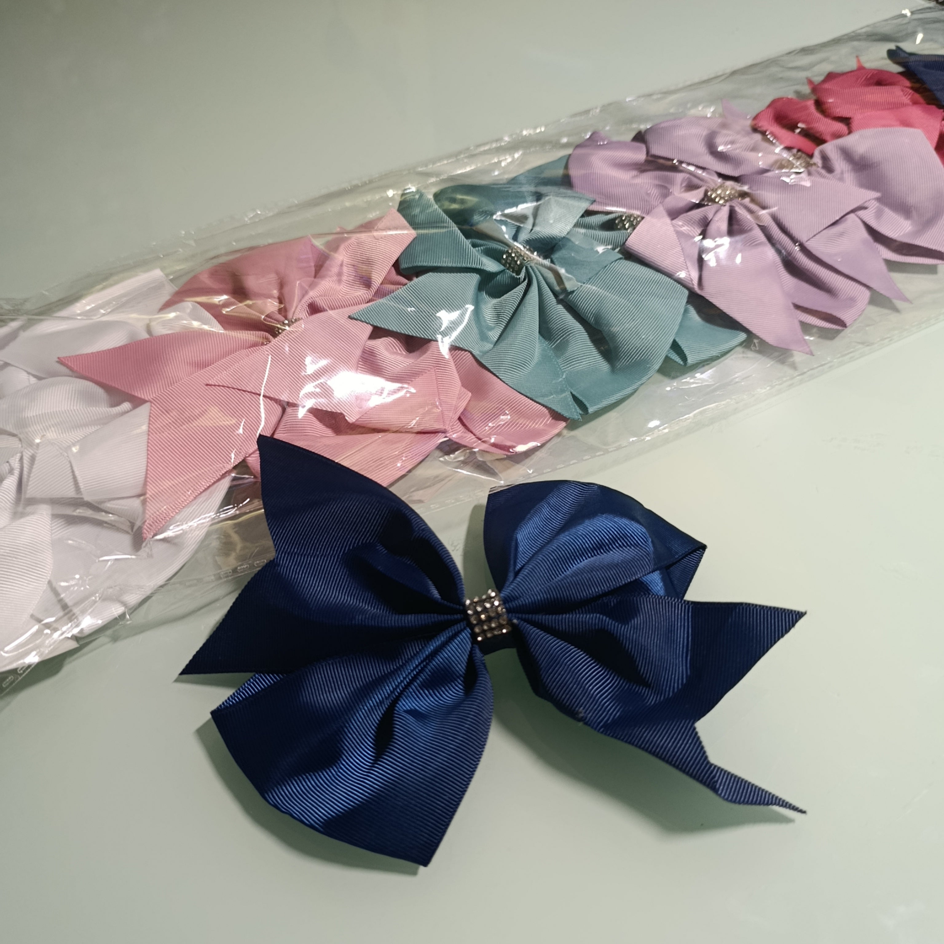 MOÑO DE LISTON DE 15 CM PARA CABELLO SURTIDO EN COLORES POR MAYOREO