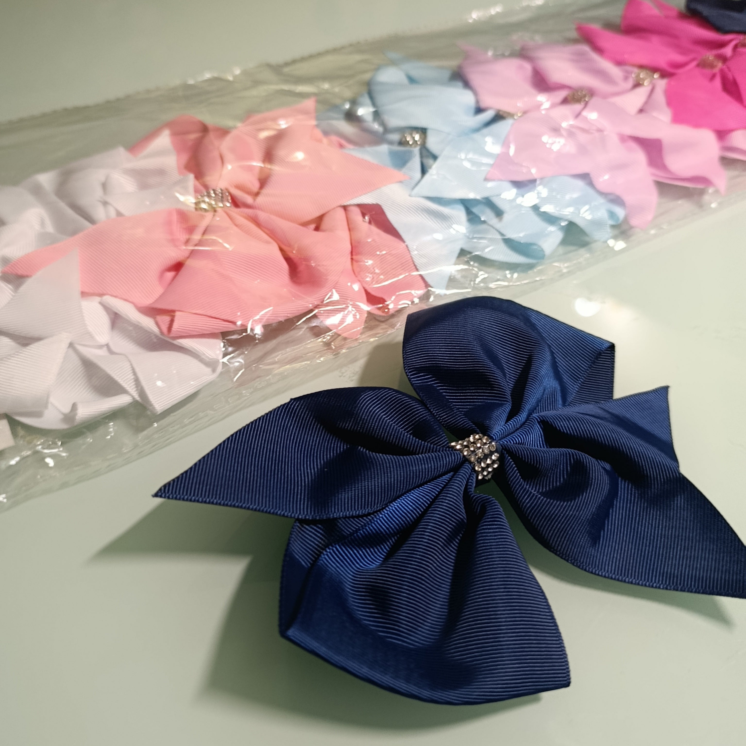 MOÑO DE LISTON DE 15 CM PARA CABELLO SURTIDO EN COLORES POR MAYOREO