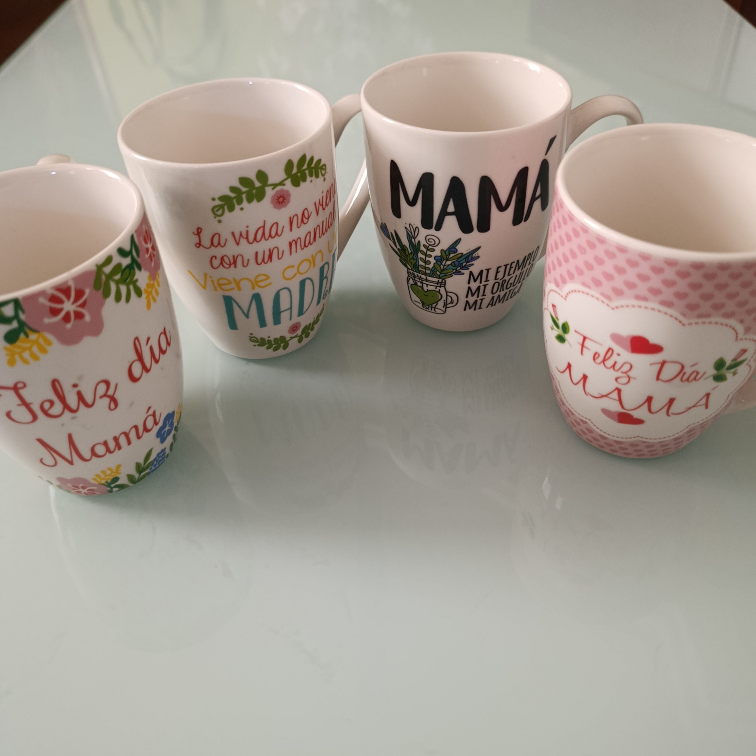 TAZA DE CERAMICA CON MOTIVOS DEL DIA DE LAS MADRES 10.5 CM DE ALTO POR 8.5 CM DE ANCHO SURTIDA EN DISEÑOS POR MAYOREO