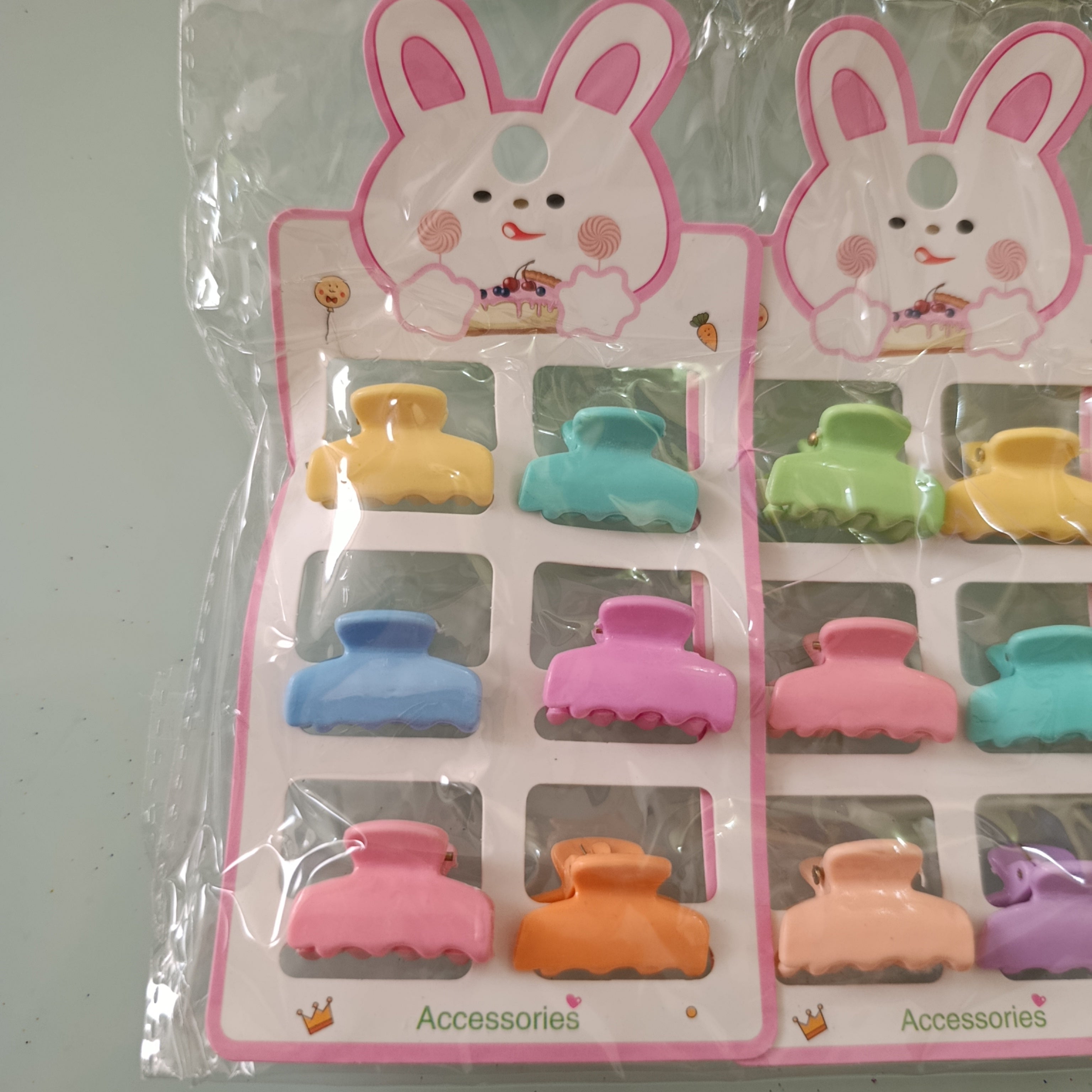 PINZA PARA CABELLO CHICA DE 2.5 CM  EN BLISTER DE 6 PZAS SURTIDO EN DISEÑOS Y COLORES POR MAYOREO