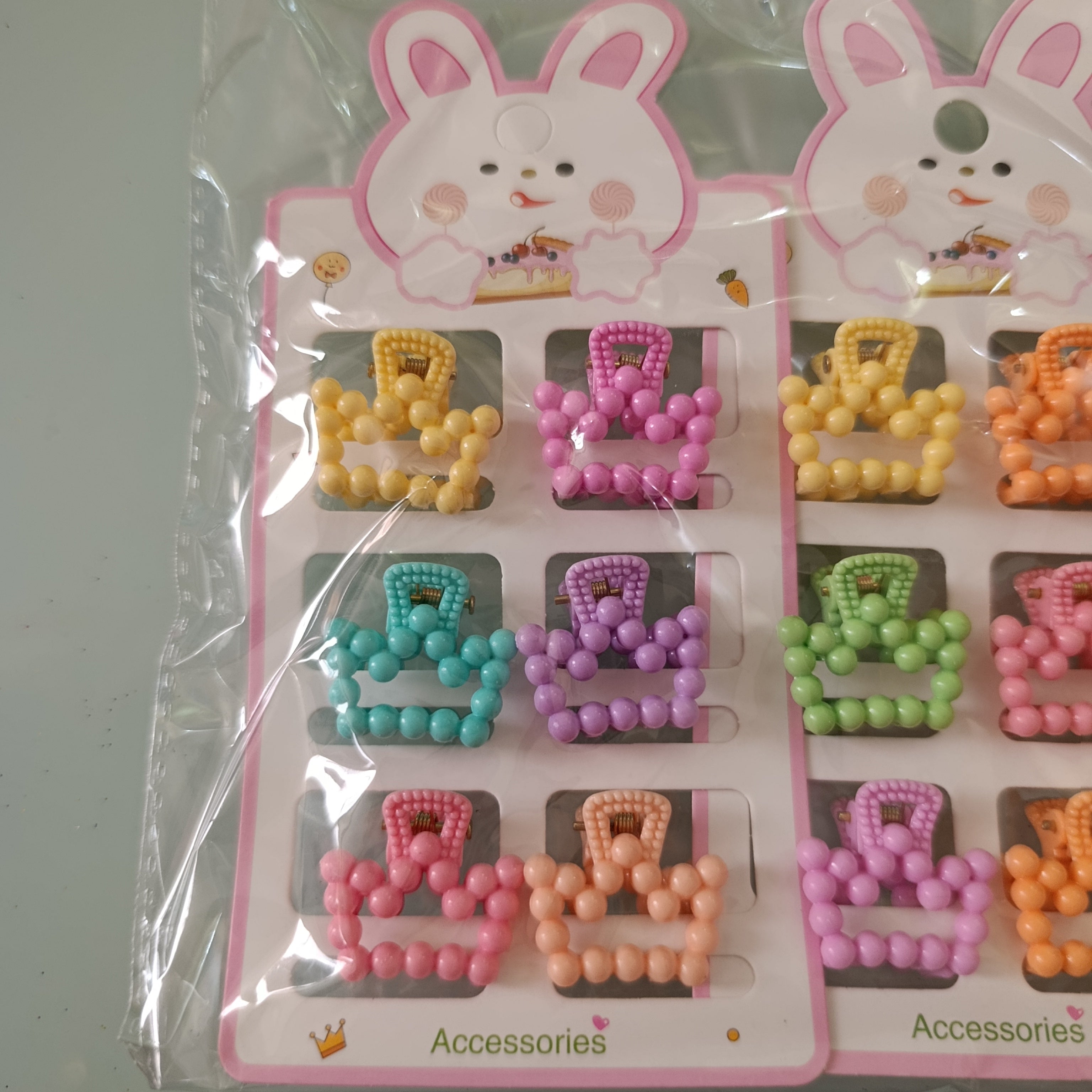 PINZA PARA CABELLO CHICA DE 2.5 CM  EN BLISTER DE 6 PZAS SURTIDO EN DISEÑOS Y COLORES POR MAYOREO