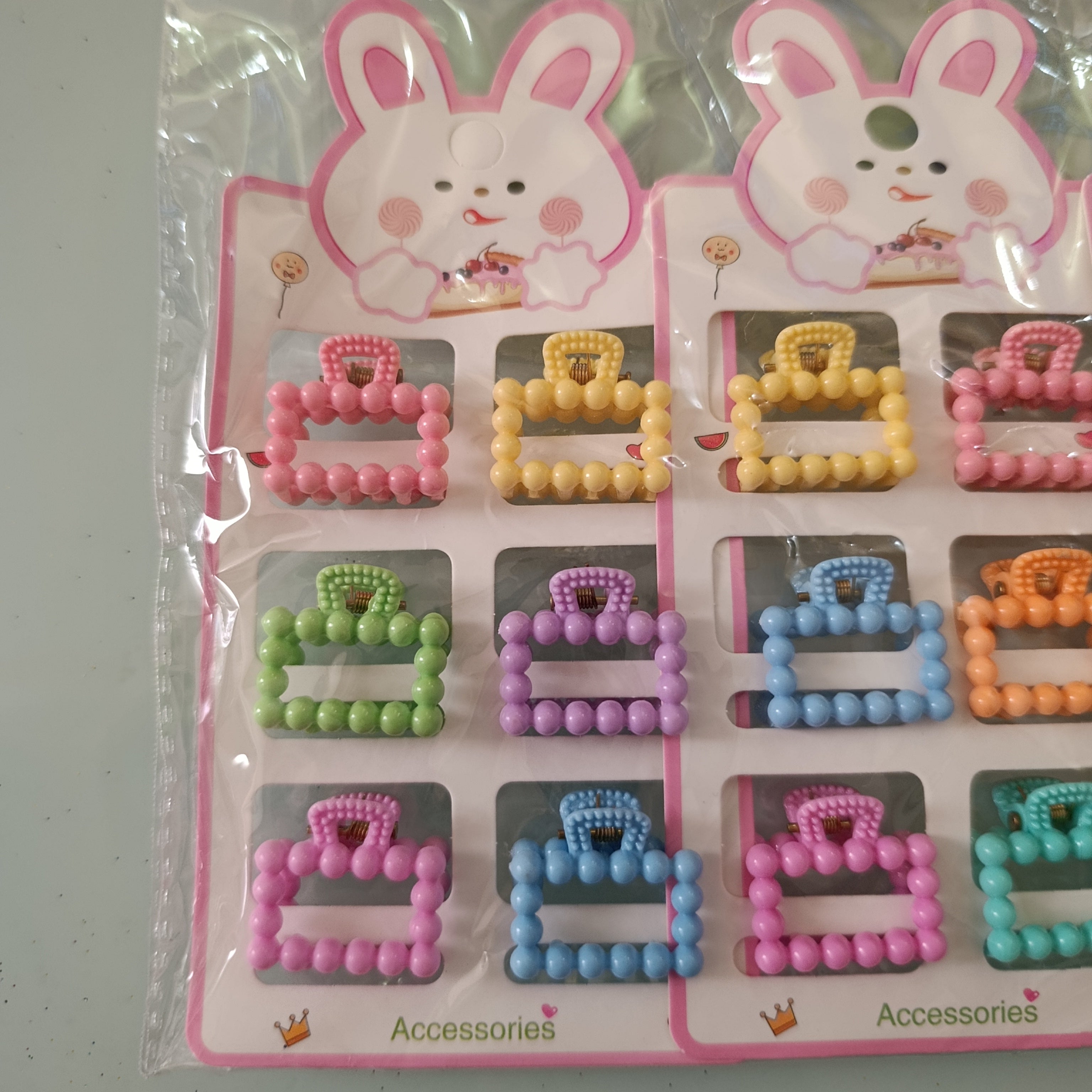 PINZA PARA CABELLO CHICA DE 2.5 CM  EN BLISTER DE 6 PZAS SURTIDO EN DISEÑOS Y COLORES POR MAYOREO