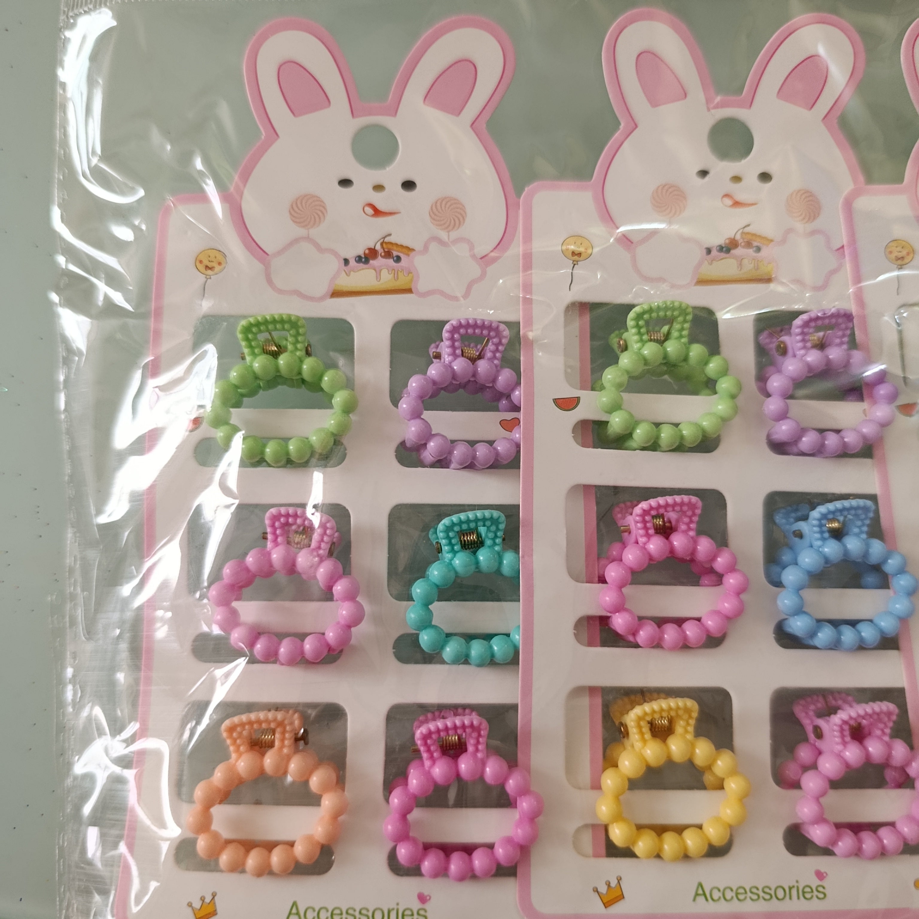 PINZA PARA CABELLO CHICA DE 2.5 CM  EN BLISTER DE 6 PZAS SURTIDO EN DISEÑOS Y COLORES POR MAYOREO