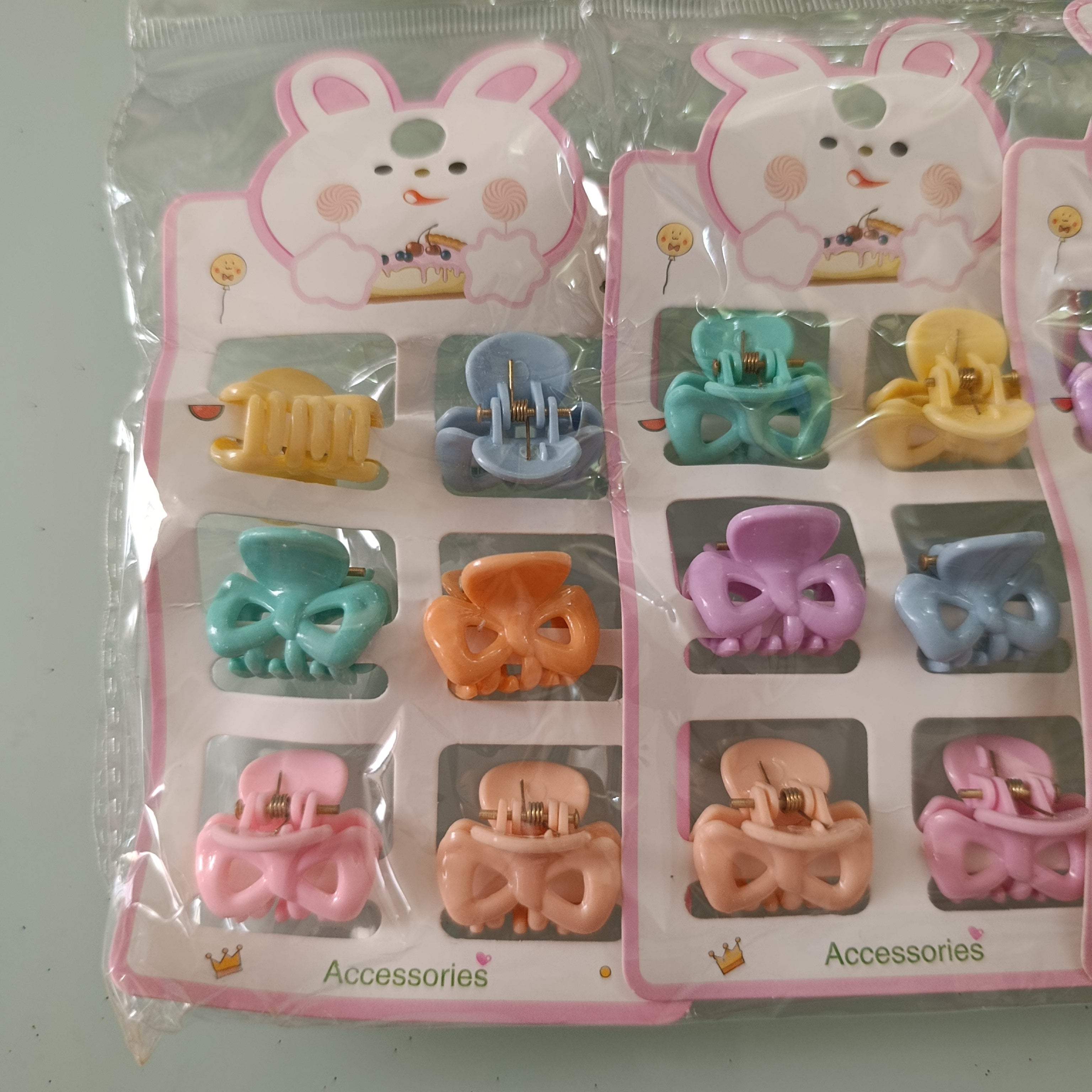 PINZA PARA CABELLO CHICA DE 2.5 CM  EN BLISTER DE 6 PZAS SURTIDO EN DISEÑOS Y COLORES POR MAYOREO