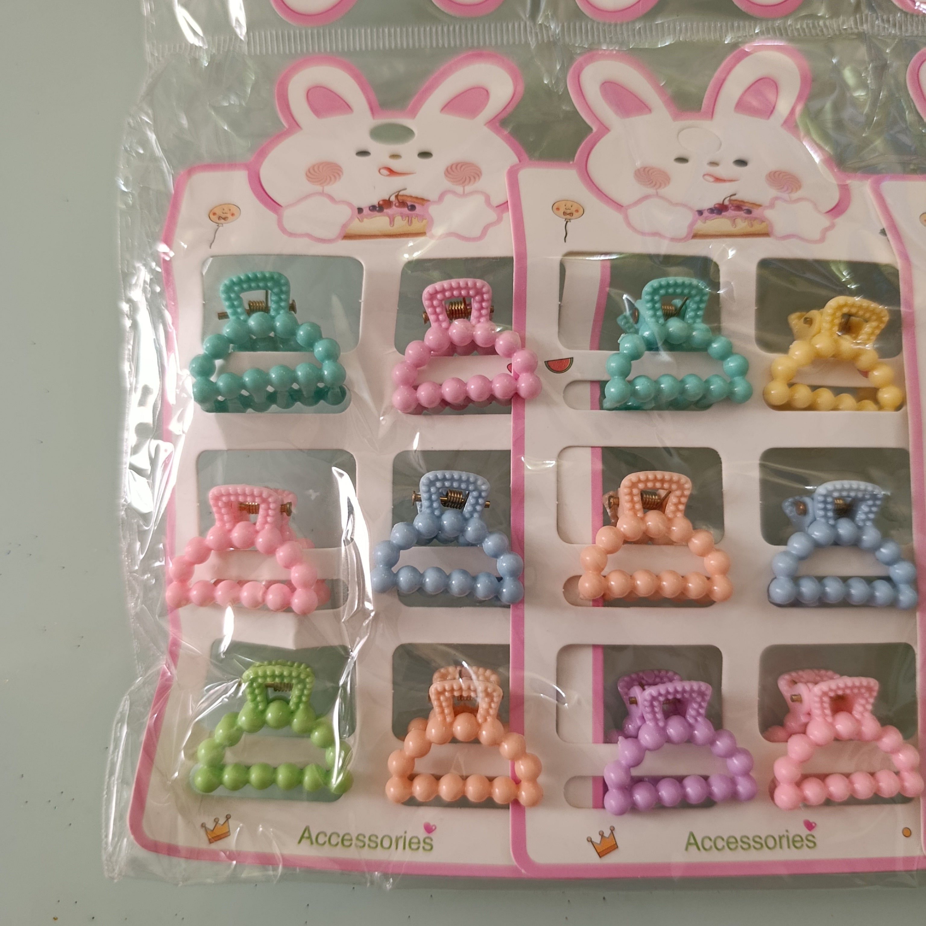 PINZA PARA CABELLO CHICA DE 2.5 CM  EN BLISTER DE 6 PZAS SURTIDO EN DISEÑOS Y COLORES POR MAYOREO