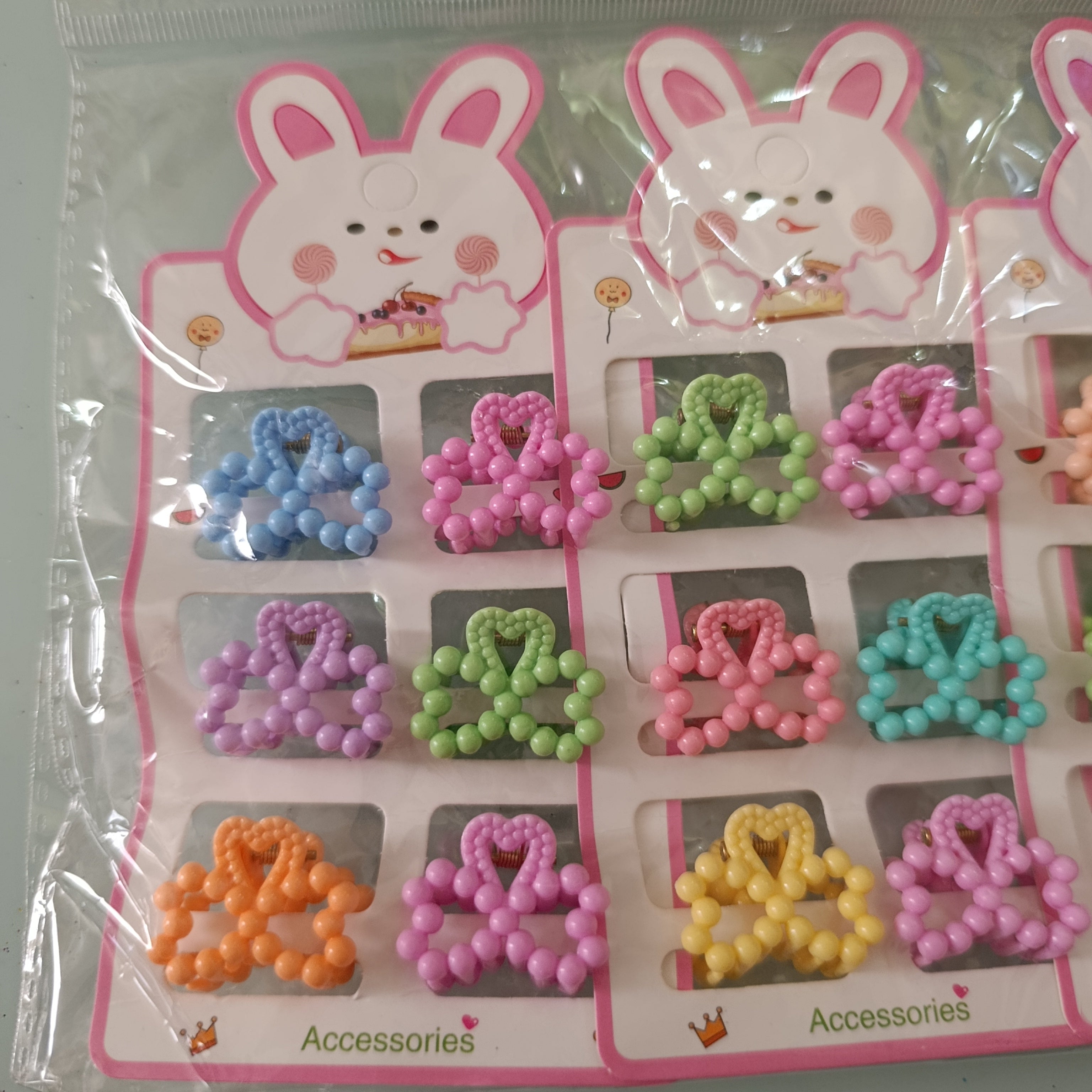 PINZA PARA CABELLO CHICA DE 2.5 CM  EN BLISTER DE 6 PZAS SURTIDO EN DISEÑOS Y COLORES POR MAYOREO