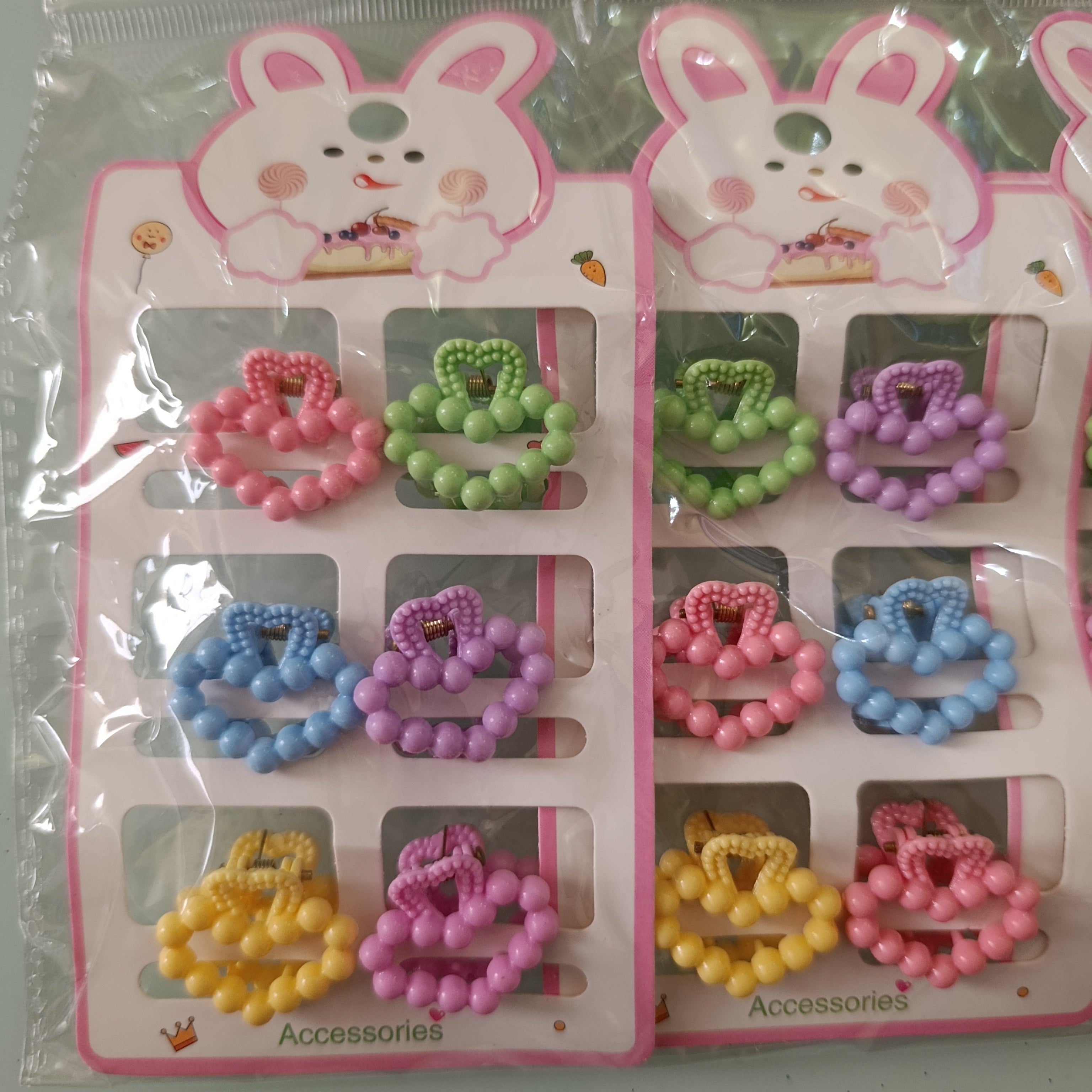 PINZA PARA CABELLO CHICA DE 2.5 CM  EN BLISTER DE 6 PZAS SURTIDO EN DISEÑOS Y COLORES POR MAYOREO