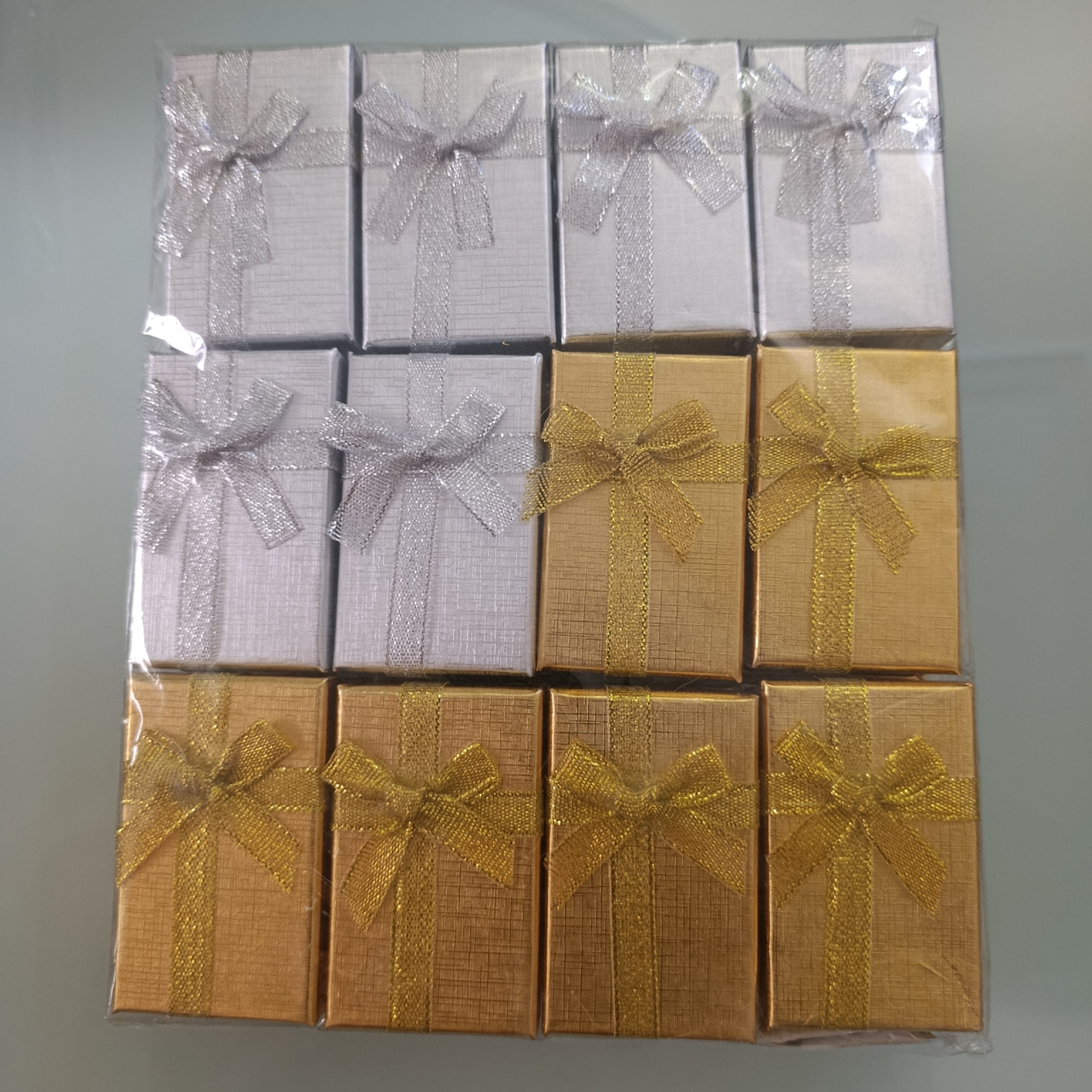 CAJITA DE REGALO CON MOÑO 8X5 CM PARA ANILLO PULCERA SURTIDA EN COLORES POR MAYOREO