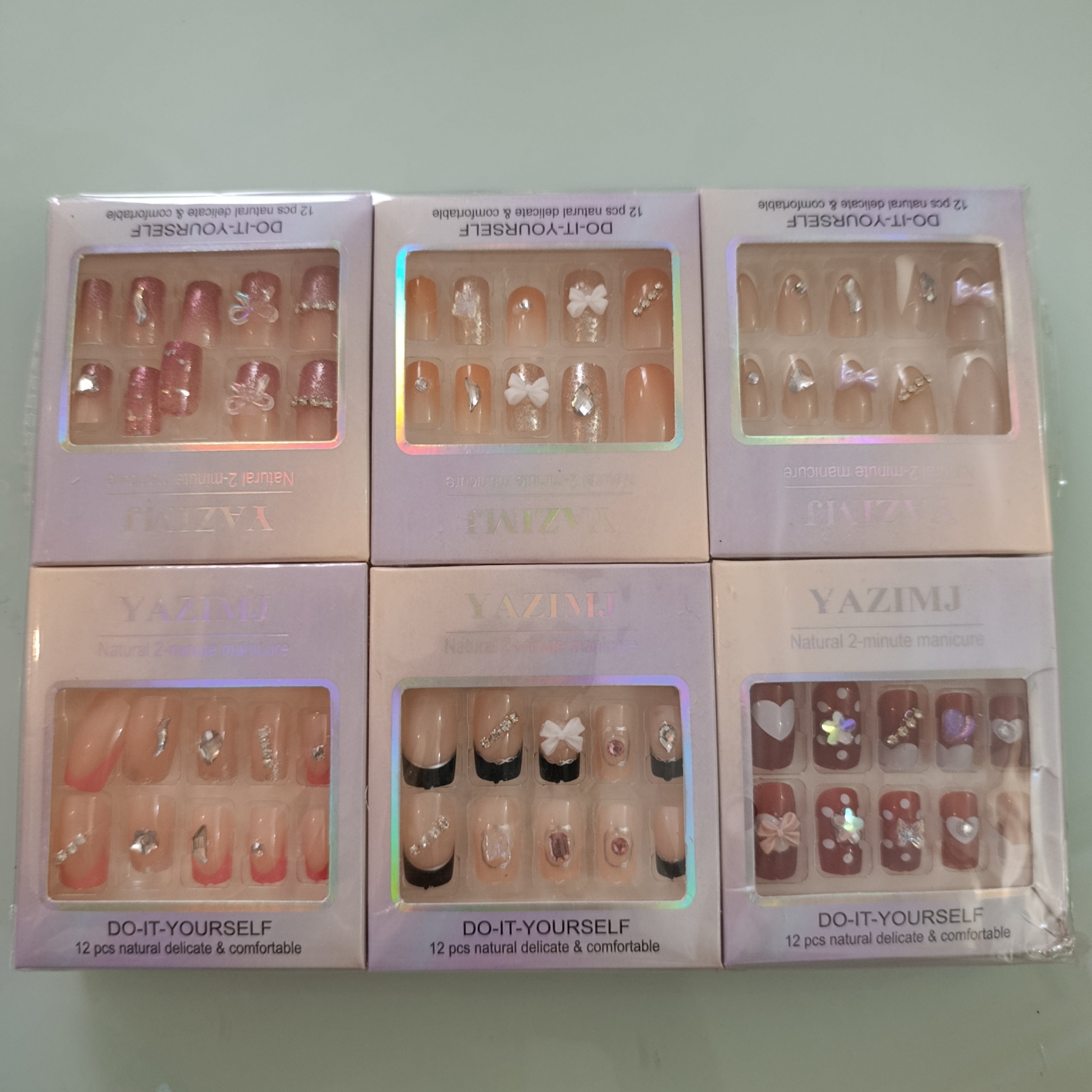 UÑAS POSTIZAS YAZIMJ DECORADAS POR MAYOREO SURTIDAS EN DISEÑOS Y COLORES