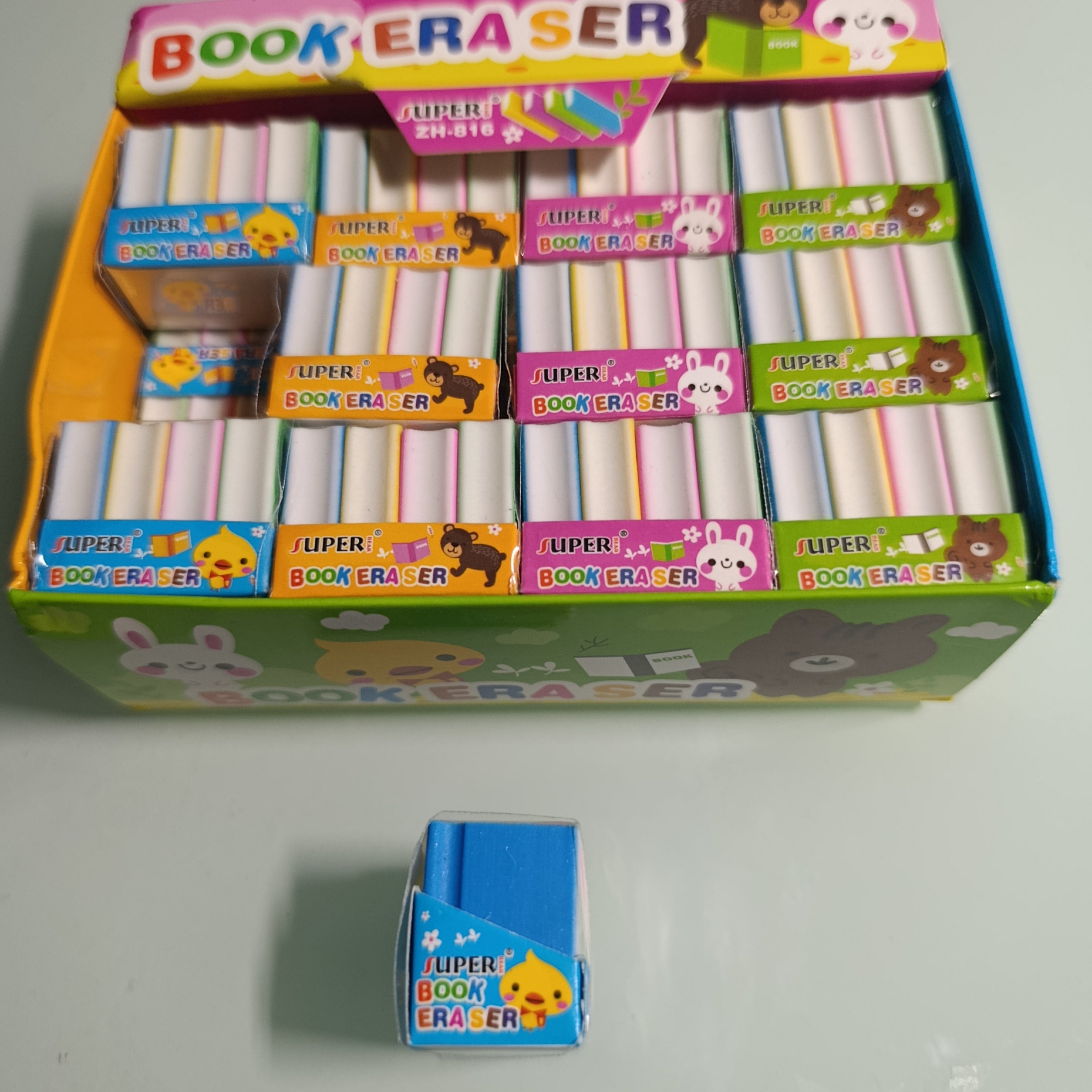 4 BORRADOR EN FORMA DE LIBROS DE 2.7 CM C/U SURTIDOS EN COLORES POR MAYOREO