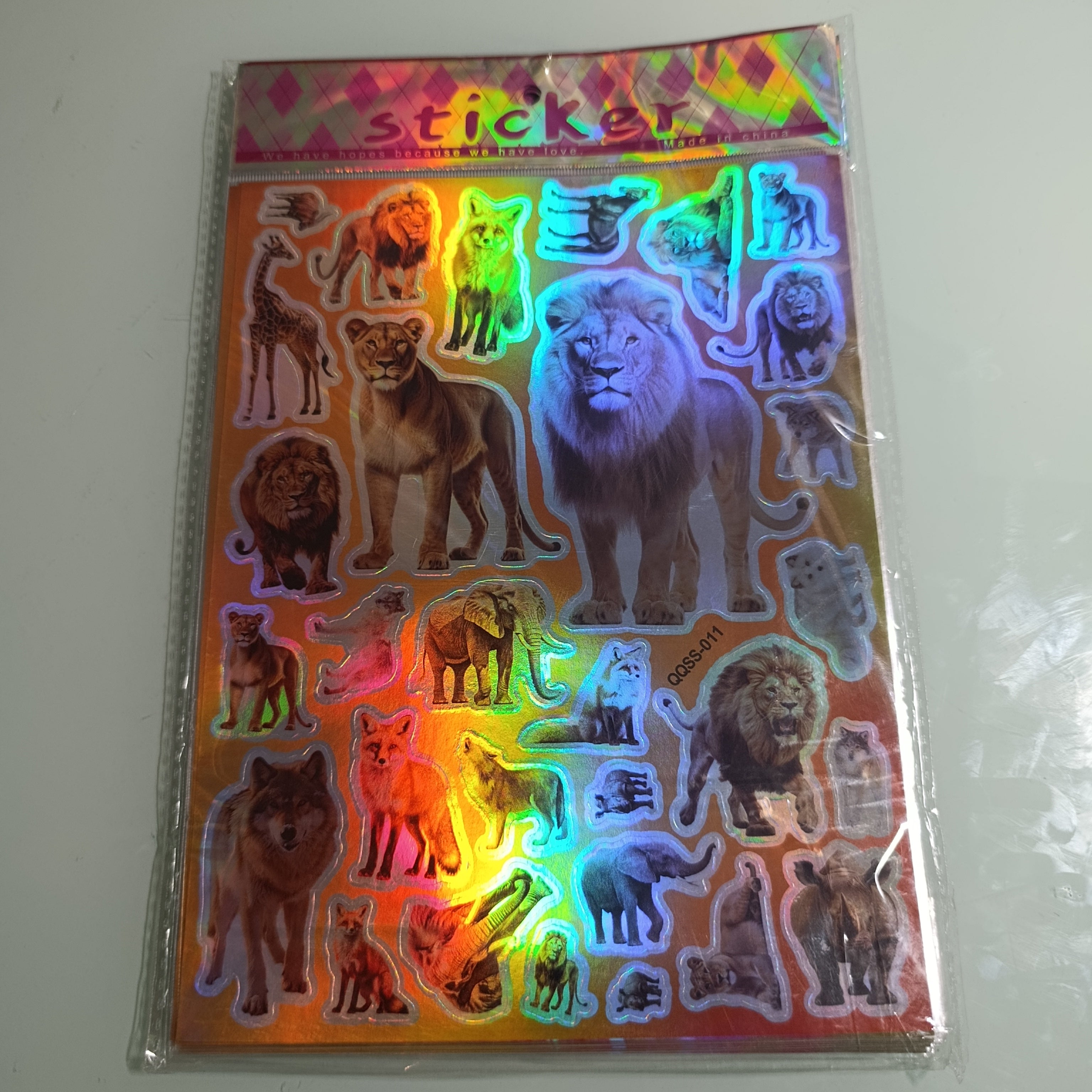 STICKER CALCOMANIA LASER METALICA 28X17.5 CM POR MAYOREO
