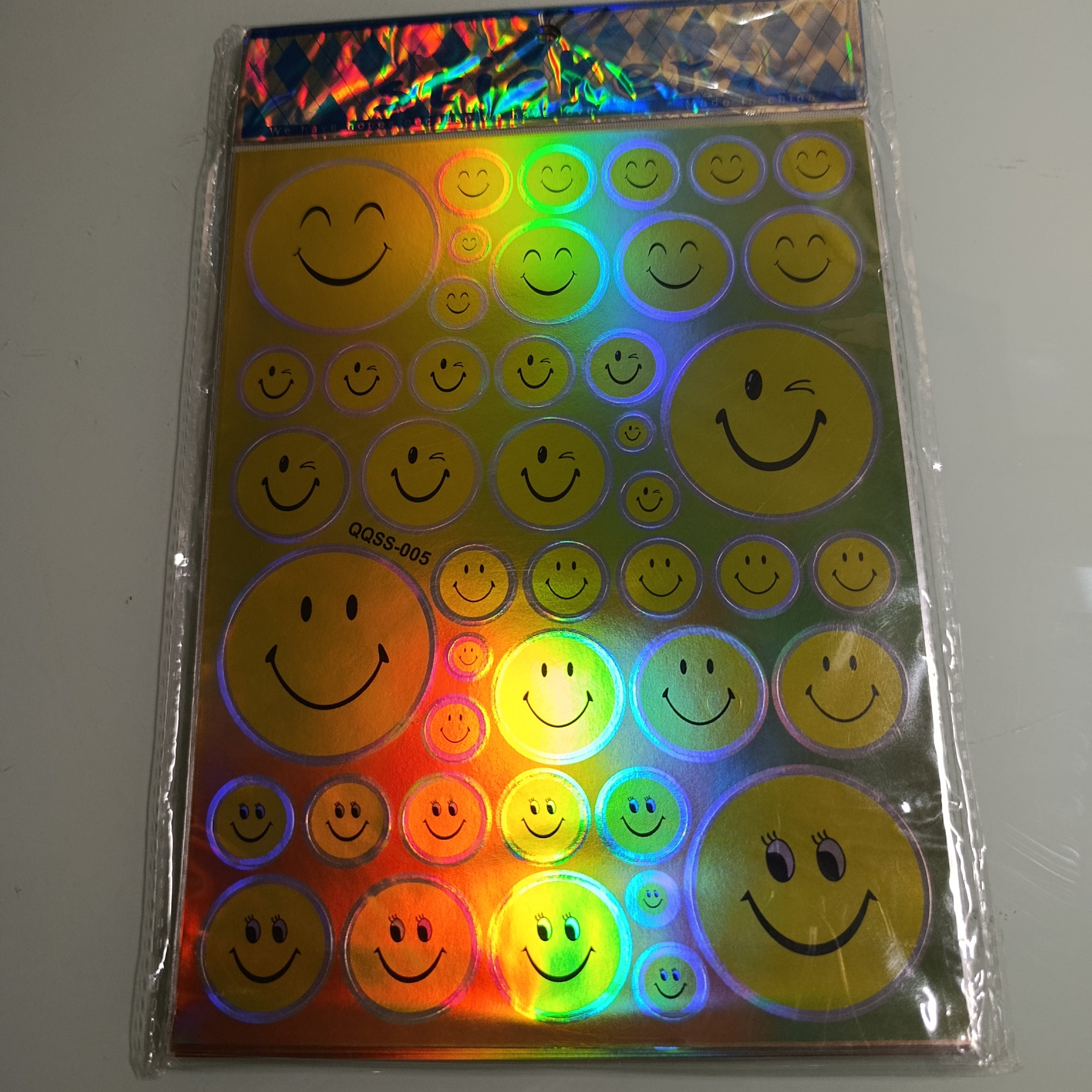 STICKER CALCOMANIA LASER METALICA 28X17.5 CM POR MAYOREO