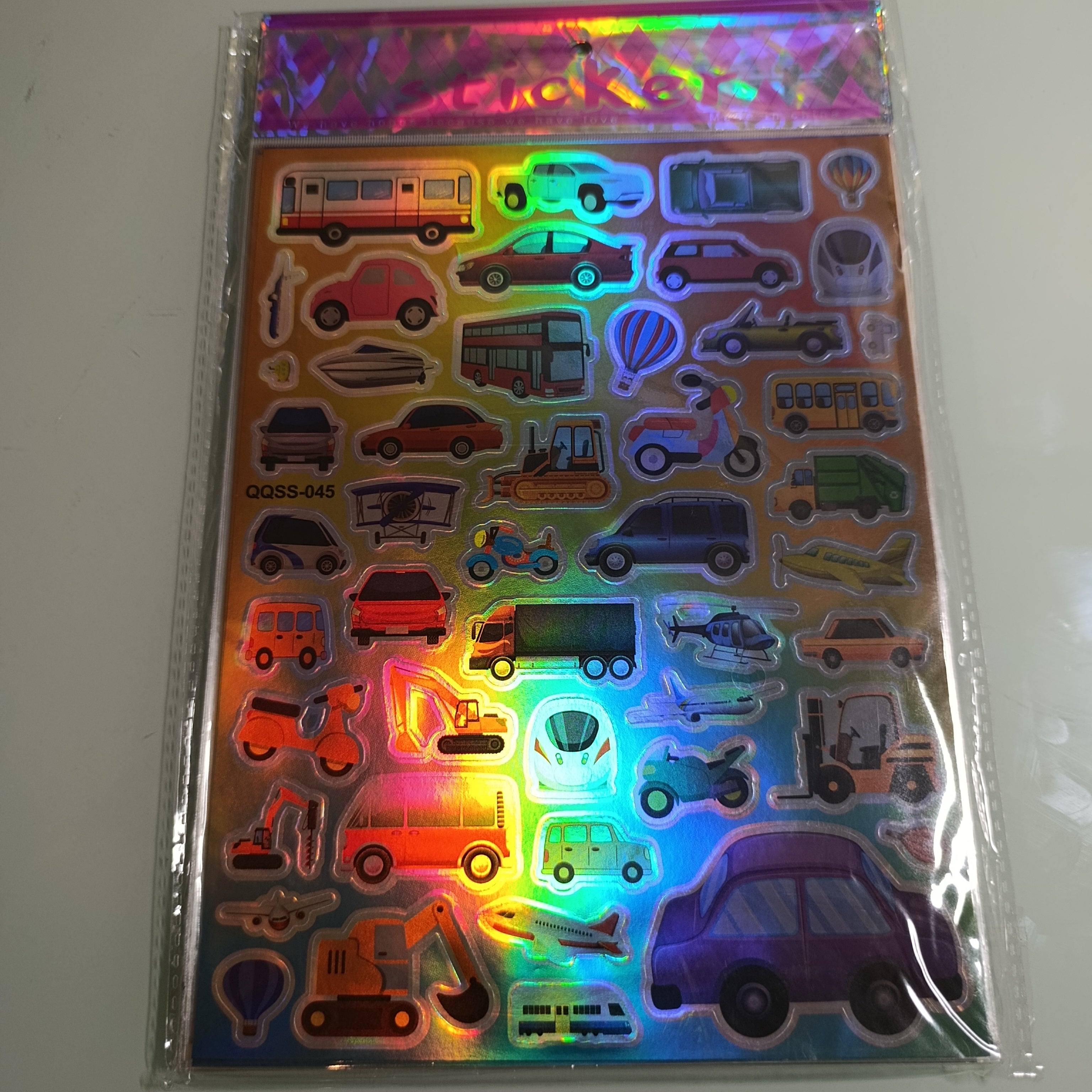 STICKER CALCOMANIA LASER METALICA 28X17.5 CM POR MAYOREO