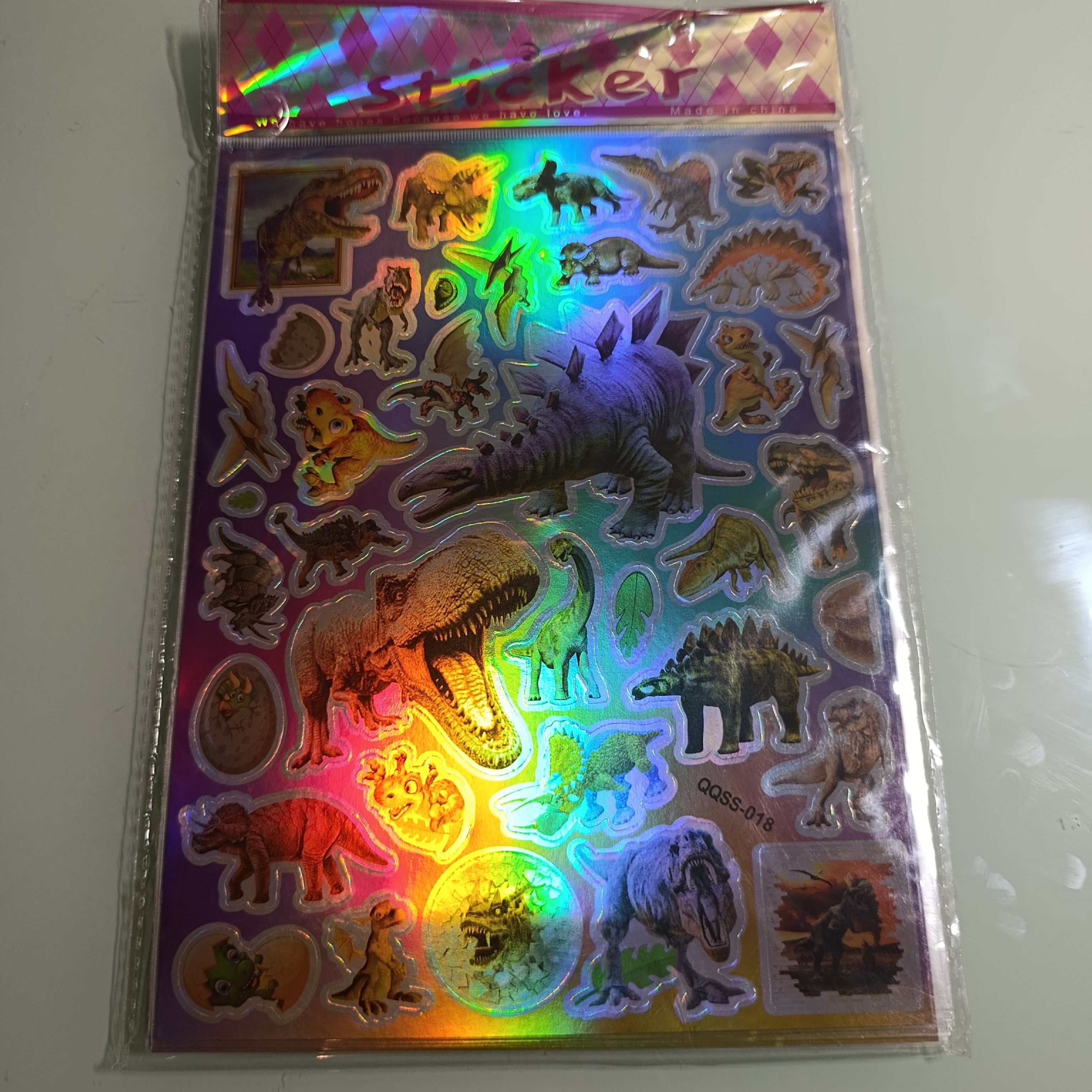 STICKER CALCOMANIA LASER METALICA 28X17.5 CM POR MAYOREO
