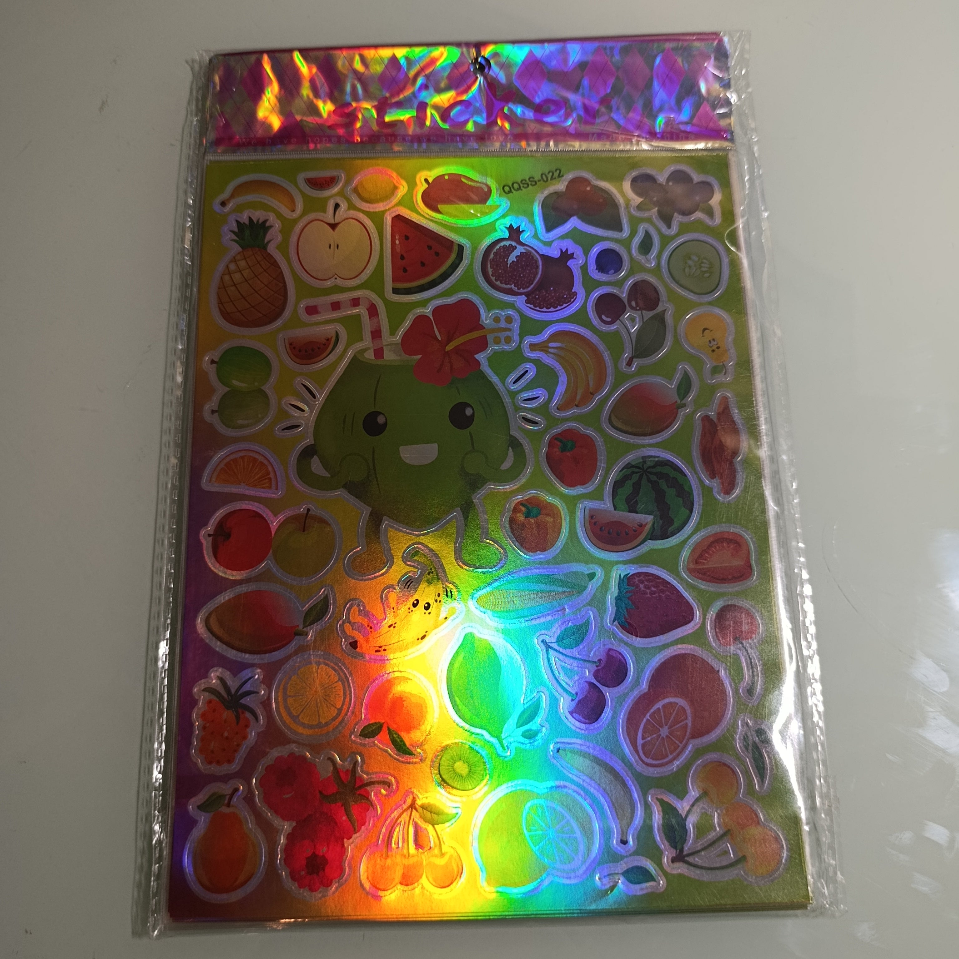 STICKER CALCOMANIA LASER METALICA 28X17.5 CM POR MAYOREO